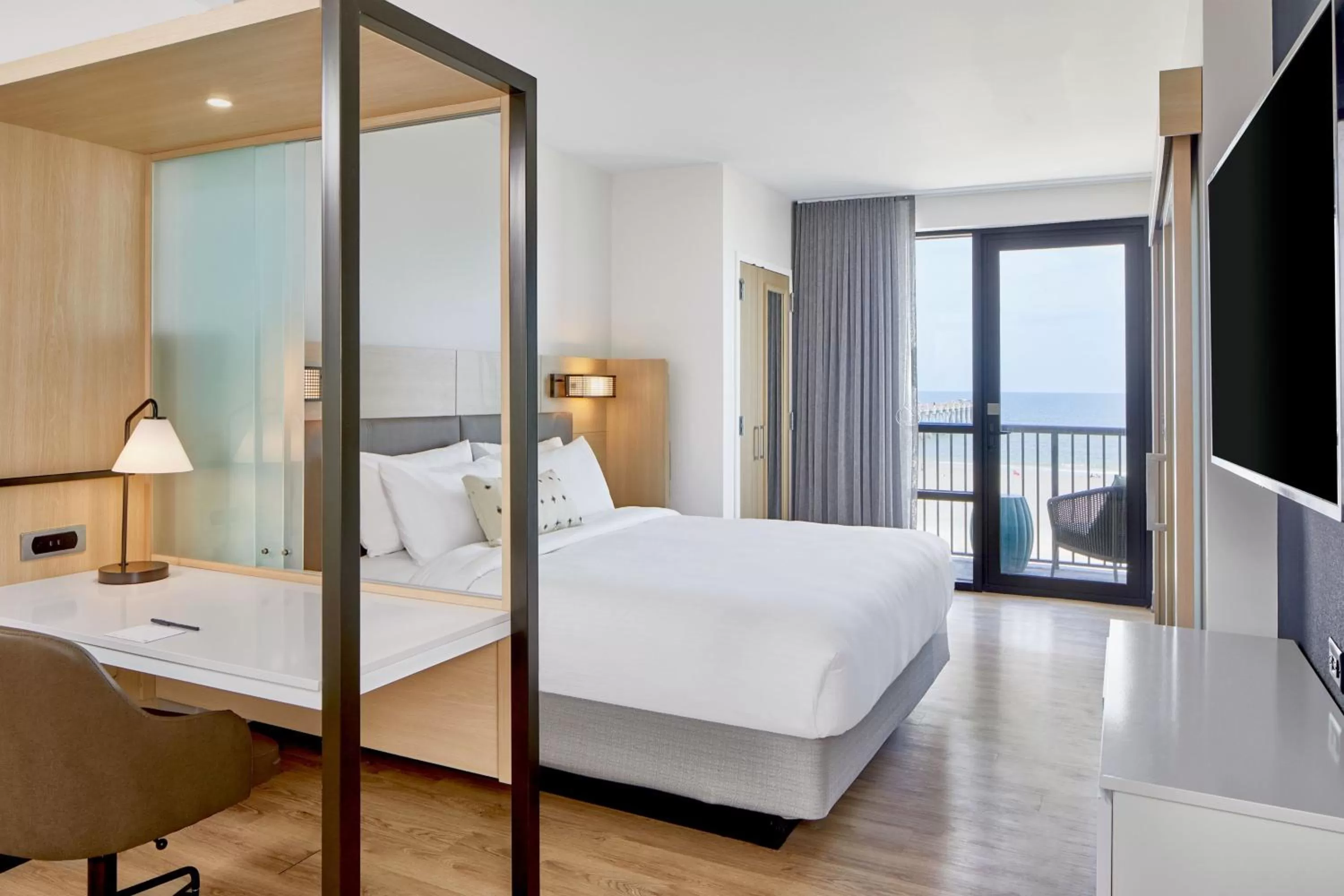 Photo of the whole room, Bed in SpringHill Suites by Marriott Jacksonville Beach Oceanfront