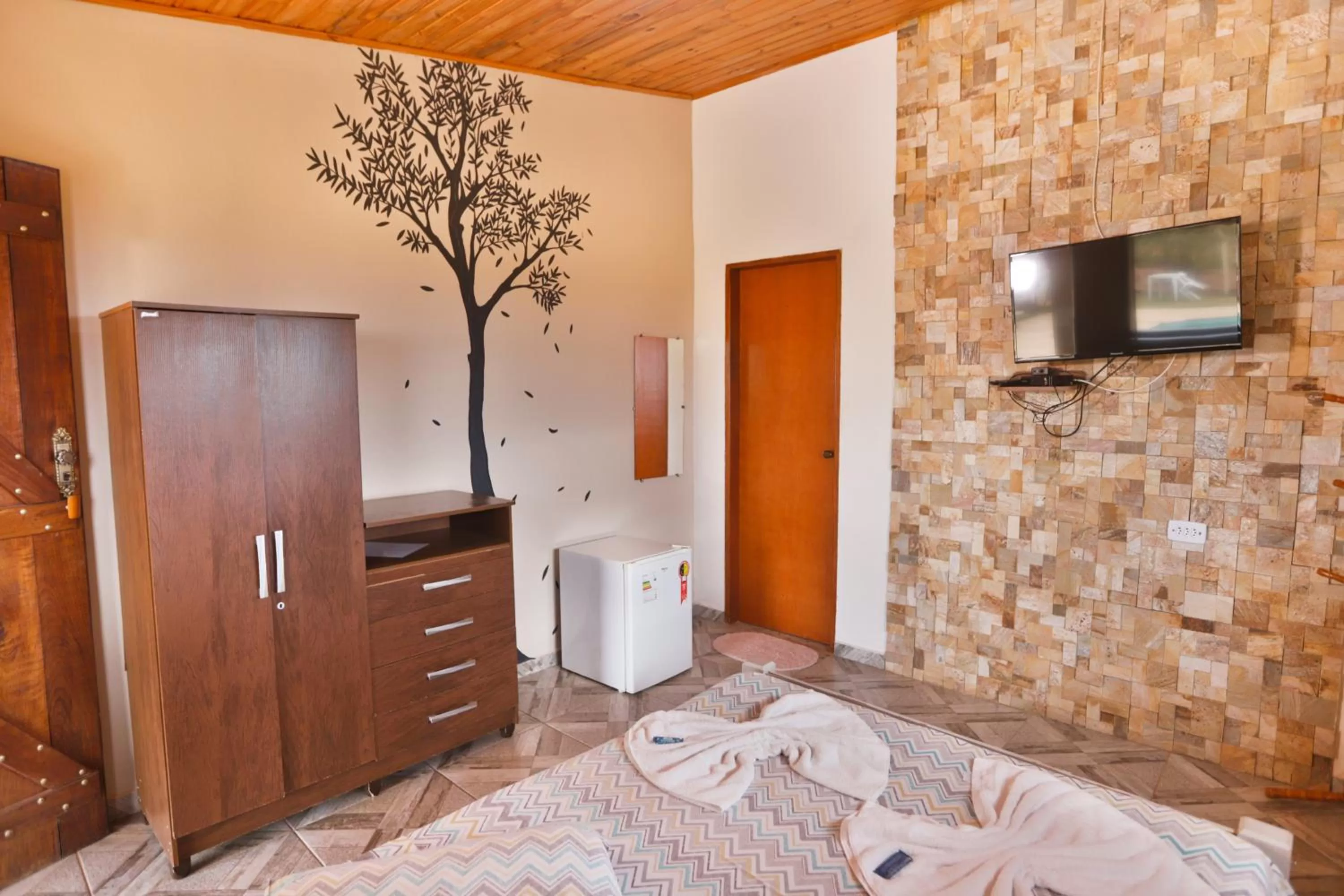 Bed in Pousada e Chales Por do Sol