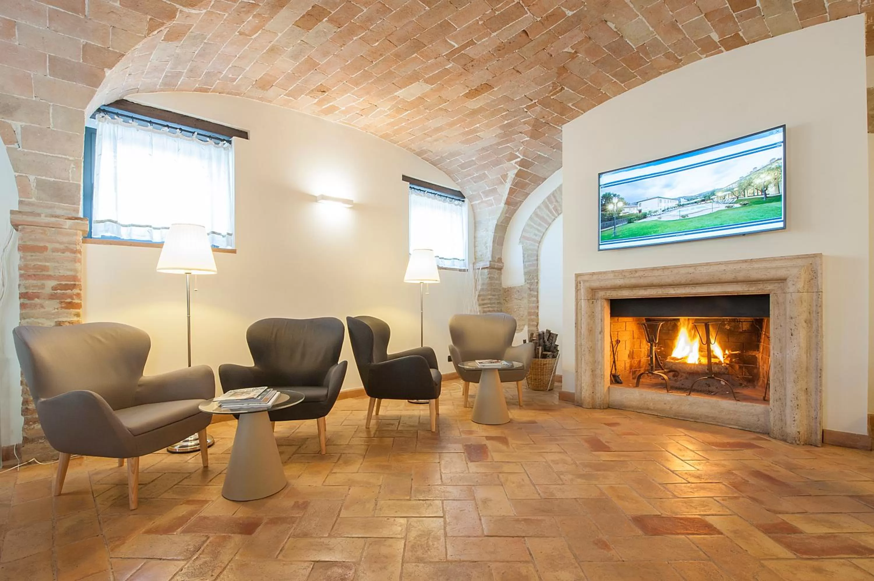 Communal lounge/ TV room in Relais dell'Olmo