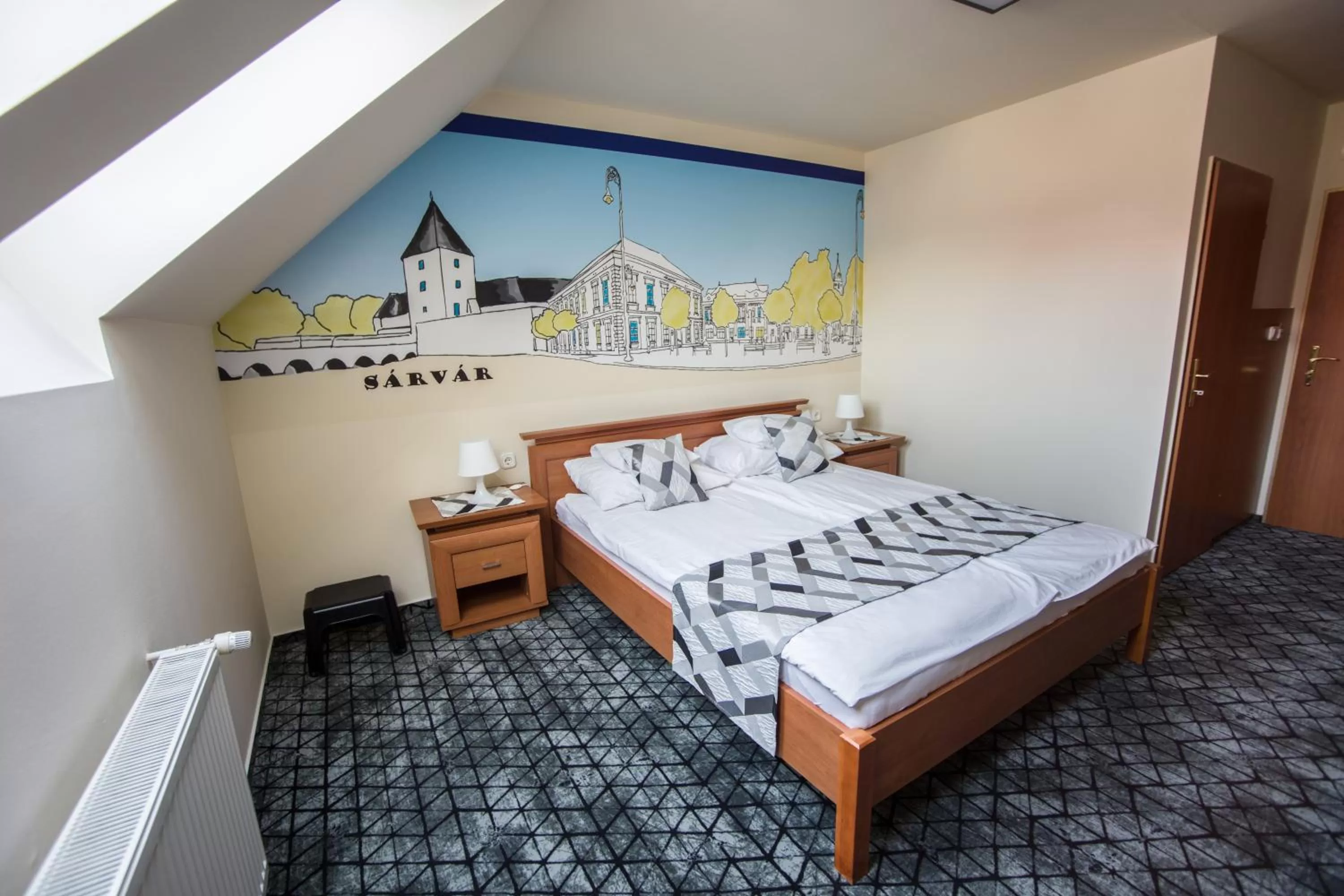 Bed in Hotel Viktória