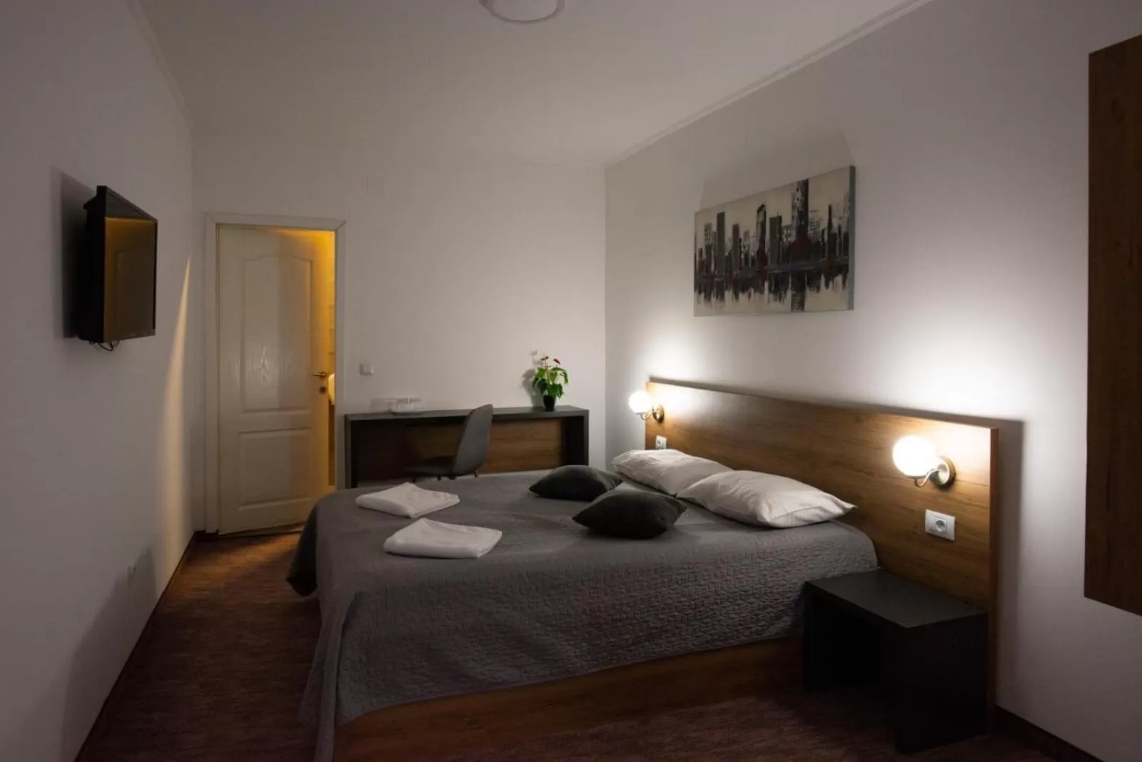 Bed in Carnival City Hotel Oradea