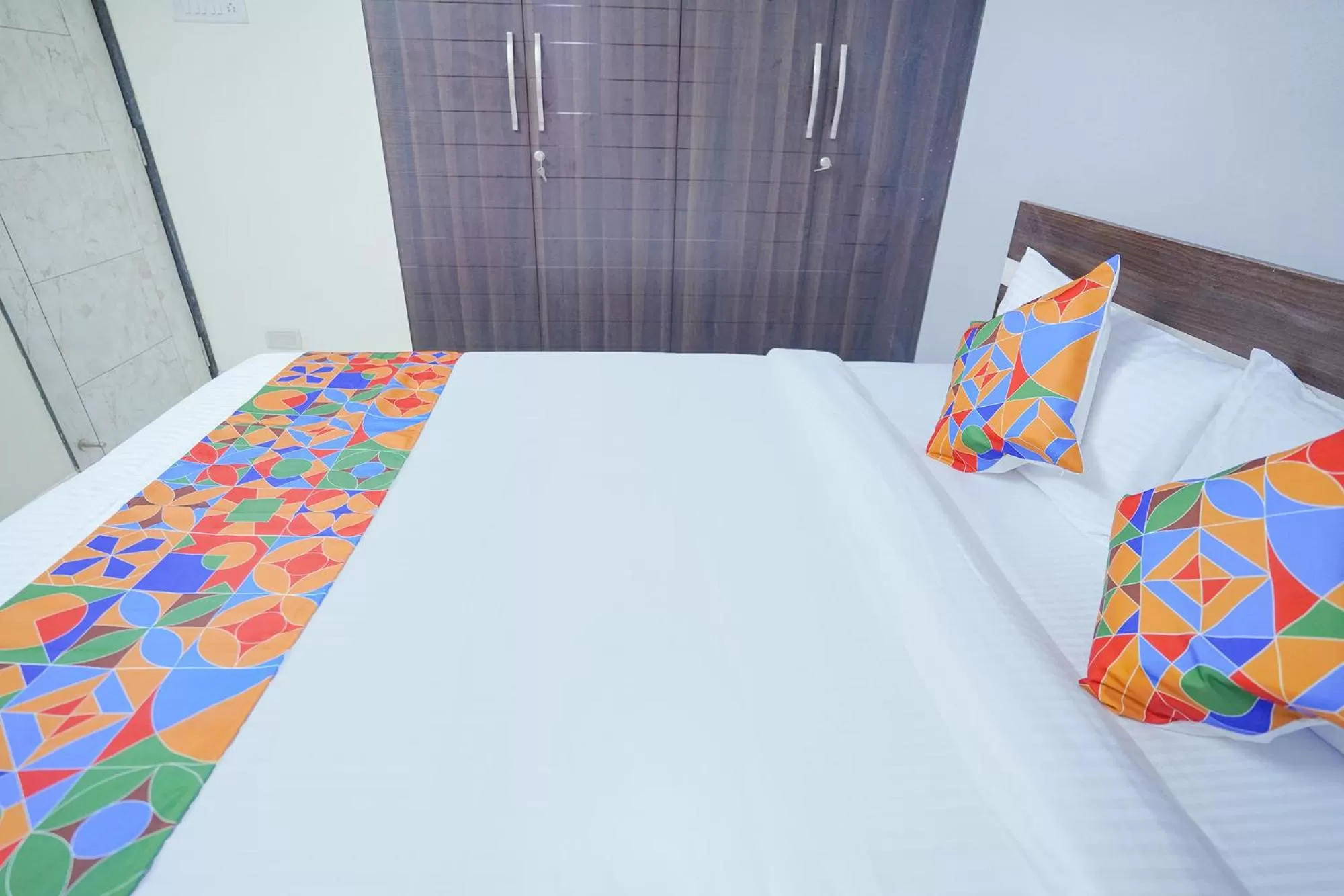 Bed in FabExpress Town Space Apartment