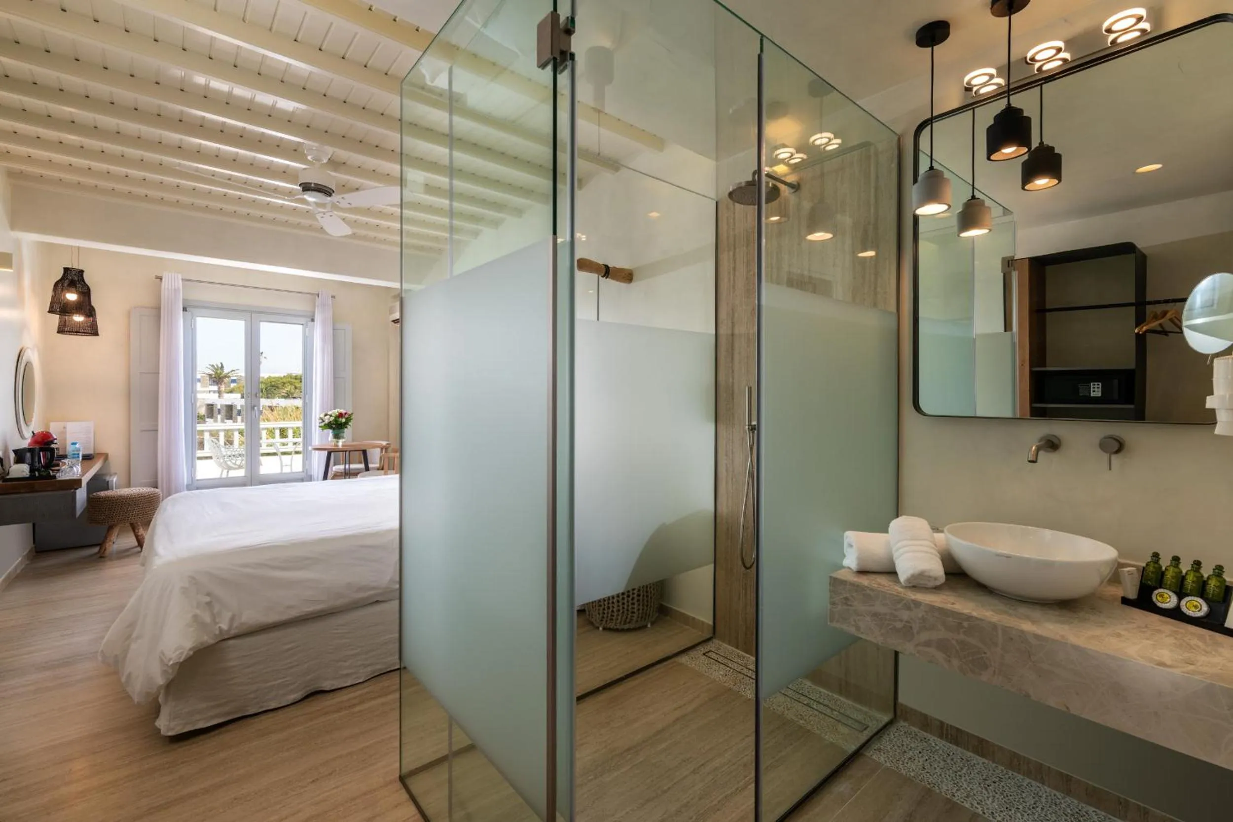 Bed in Poseidon Hotel Suites