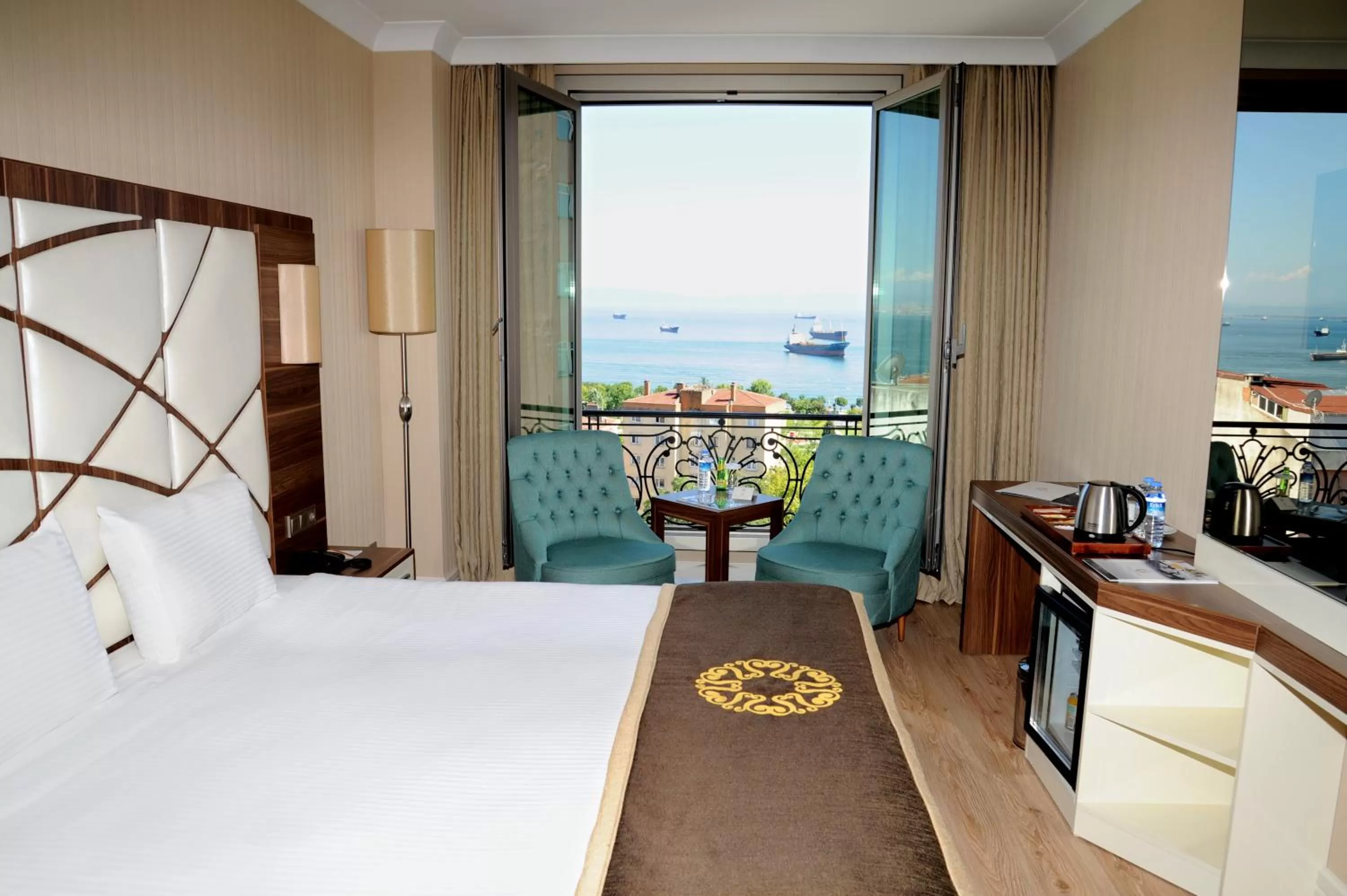 Sea view, Bed in The Grand Mira Business Hotel