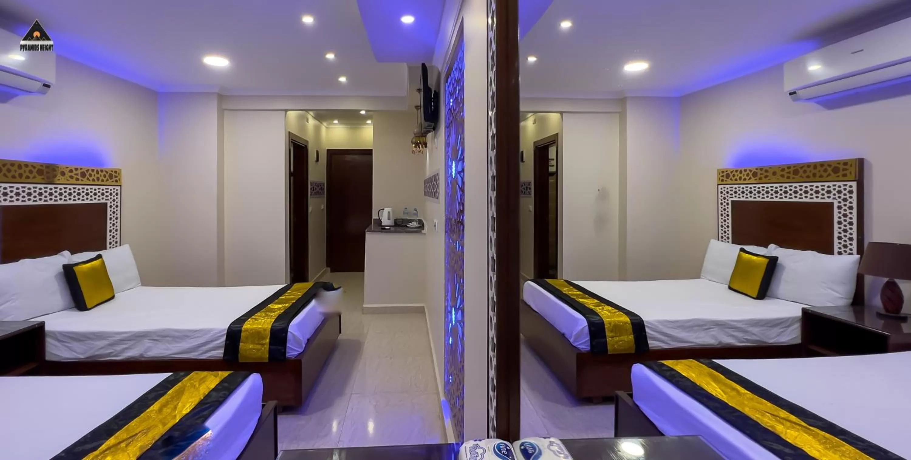 Bed in Pyramids Height Hotel & Pyramids Master Scene Rooftop