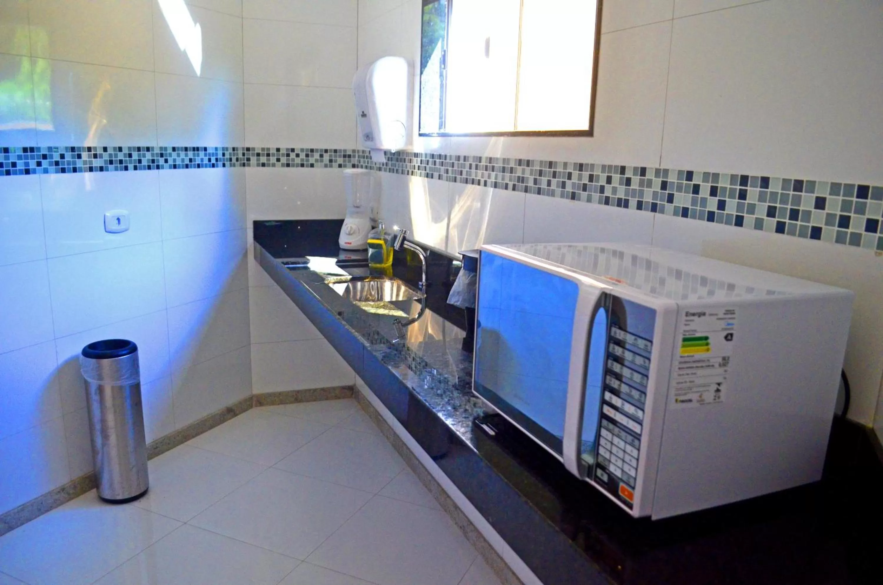 Kitchen or kitchenette in Safira Praia Hotel