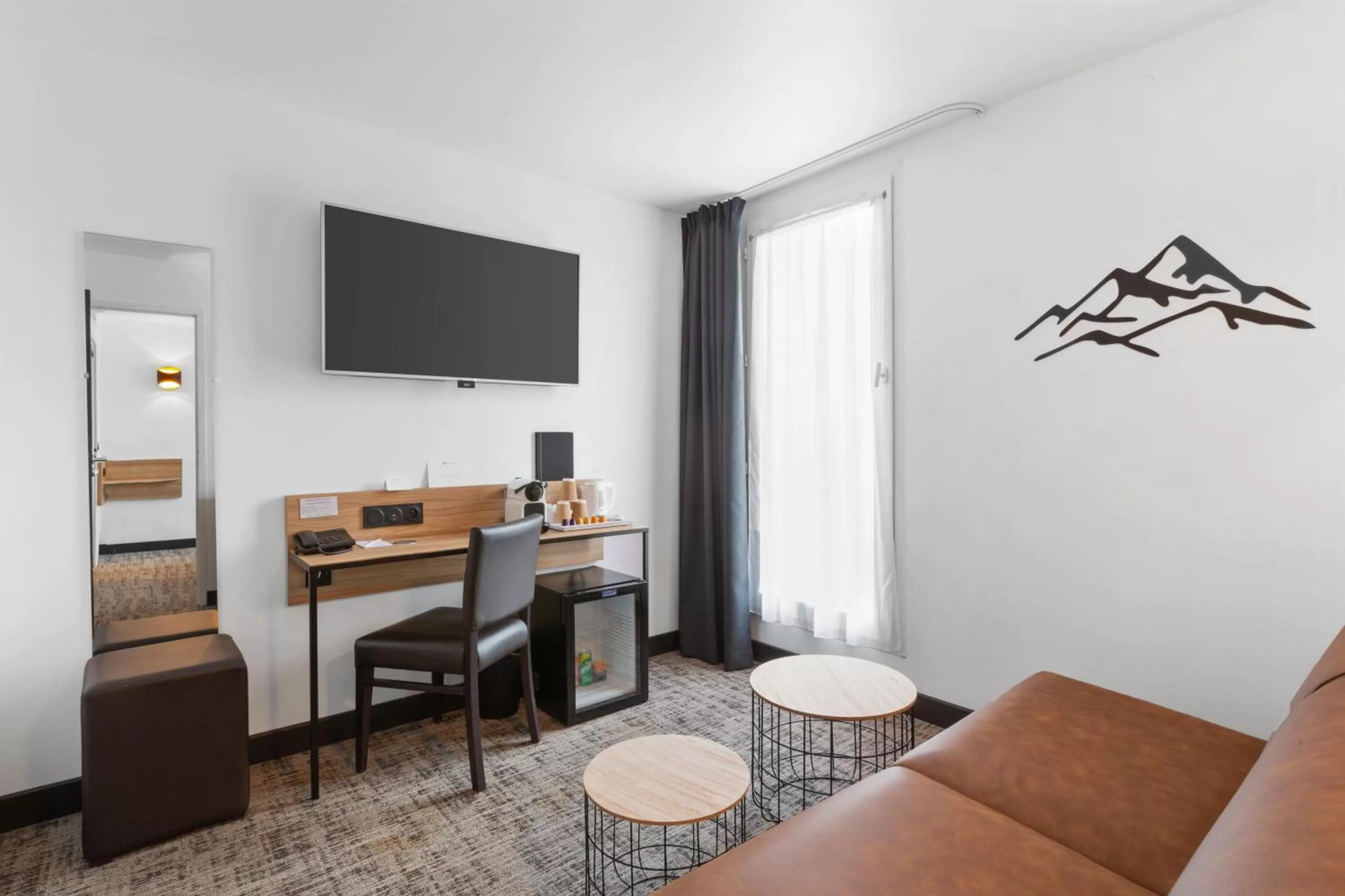 TV and multimedia, Seating Area in Best Western Hôtel International