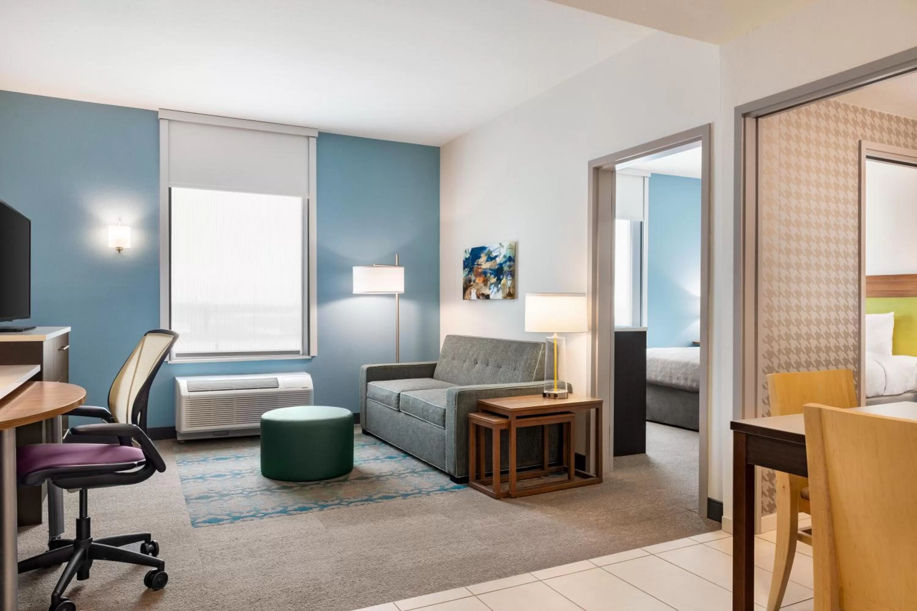 Living room, Bed in Home2 Suites by Hilton Lubbock