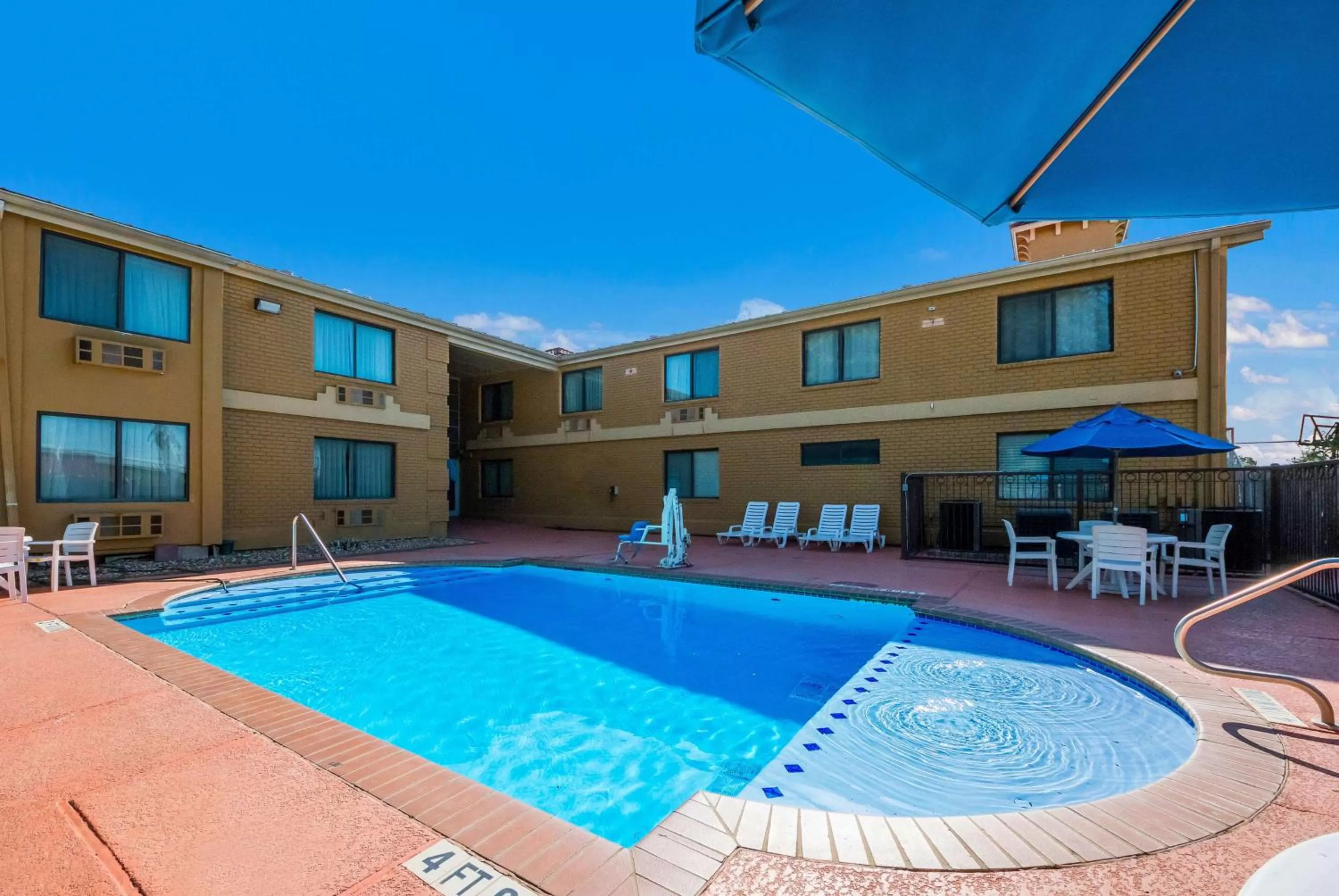 Pool view in SureStay Plus Hotel by Best Western San Antonio North