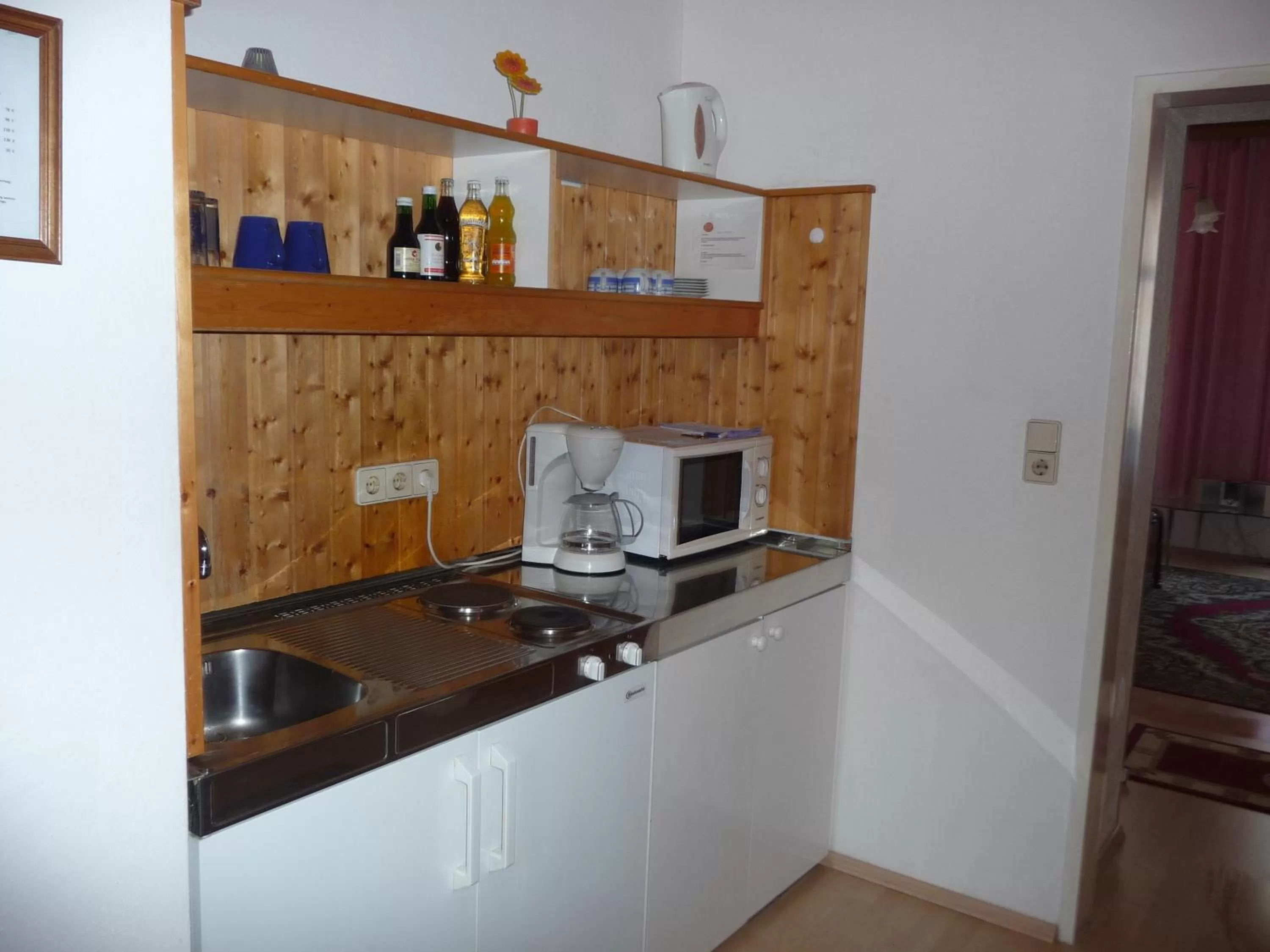 Kitchen or kitchenette in Appartement Hotel Marien-Hof
