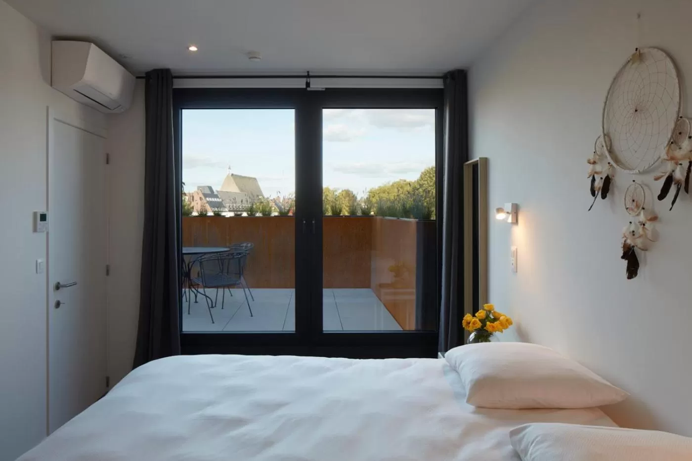 Balcony/Terrace, Bed in Alpha Hotel and Aparthotel