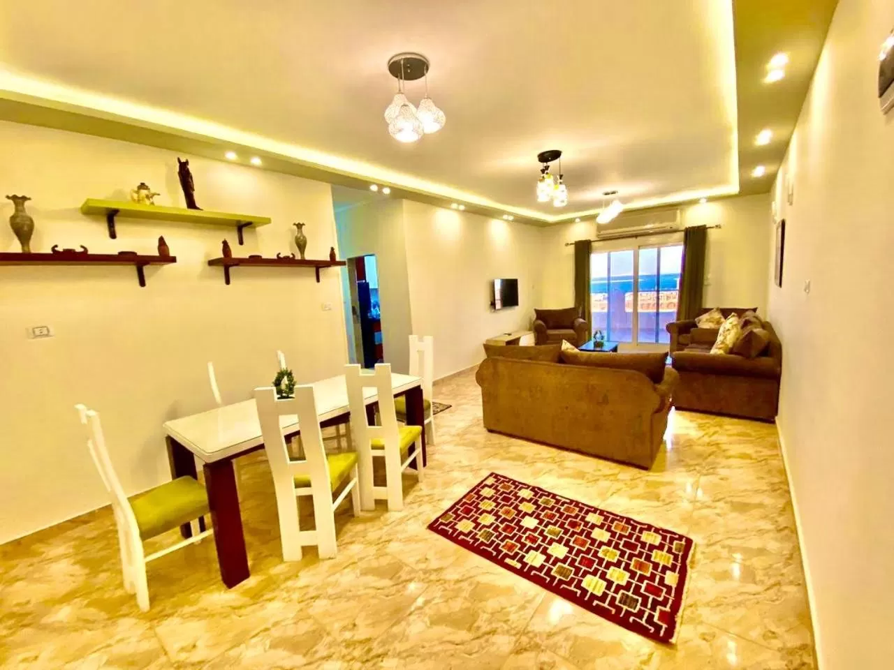 TV and multimedia, Seating Area in Charbel apartments