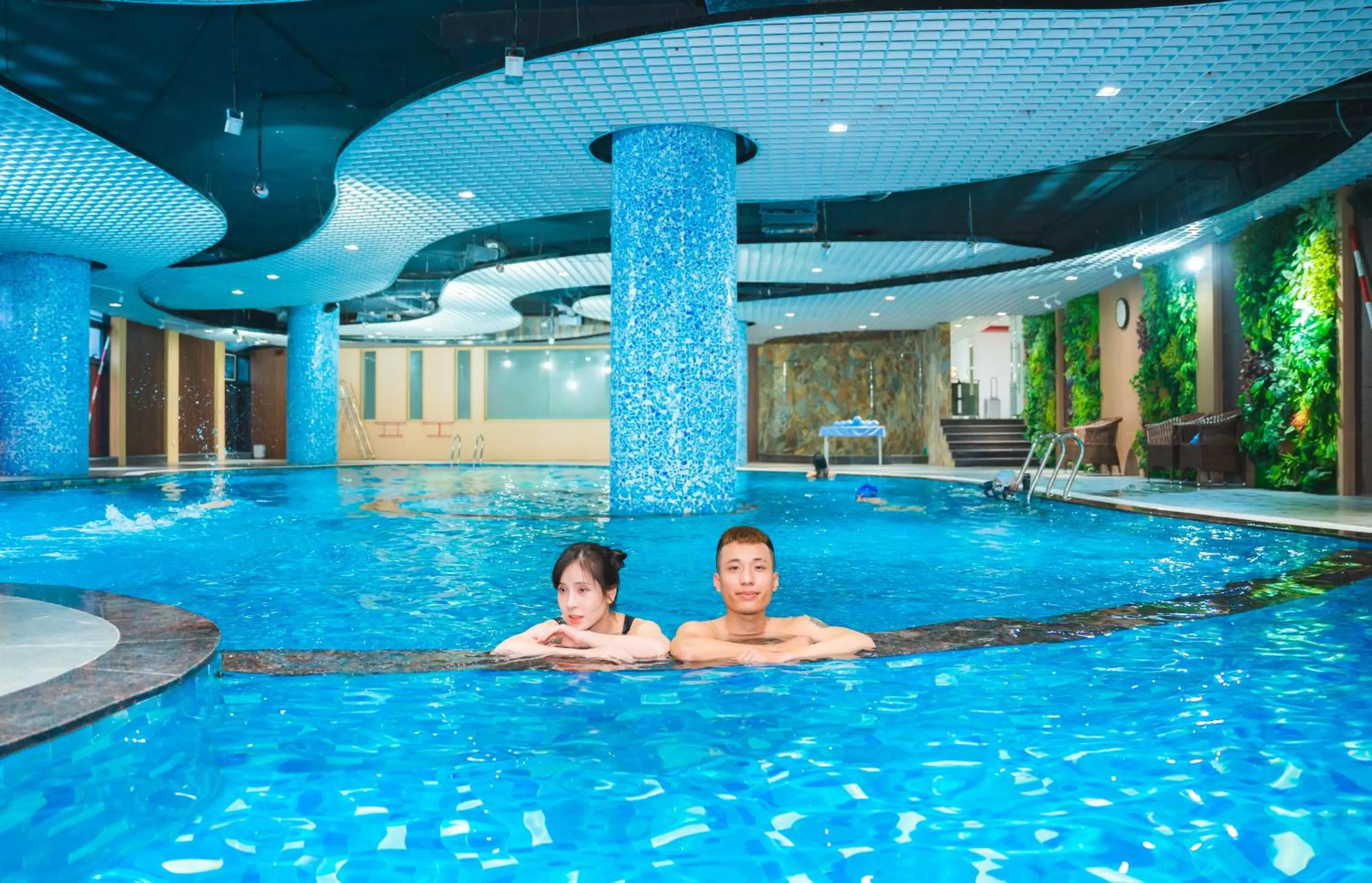Swimming pool in Ramada Hotel & Suites by Wyndham Halong Bay View