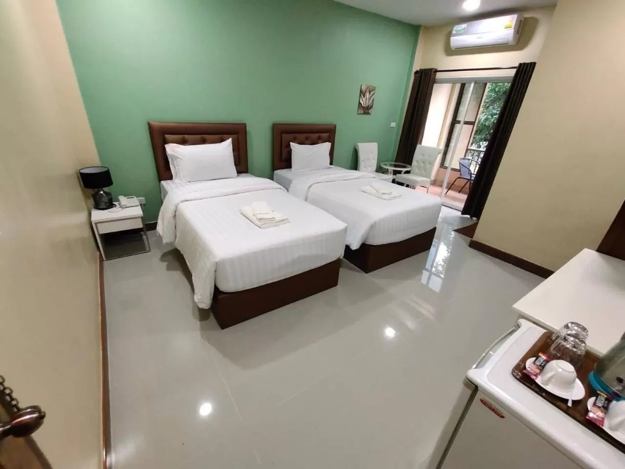Photo of the whole room, Bed in SK Resort Pattaya