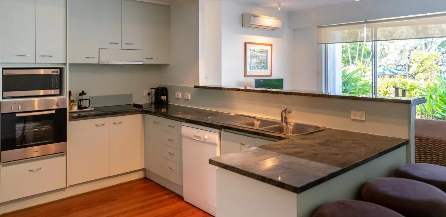 kitchen in Beaches Holiday Apartments - Official Onsite Reception & Check In