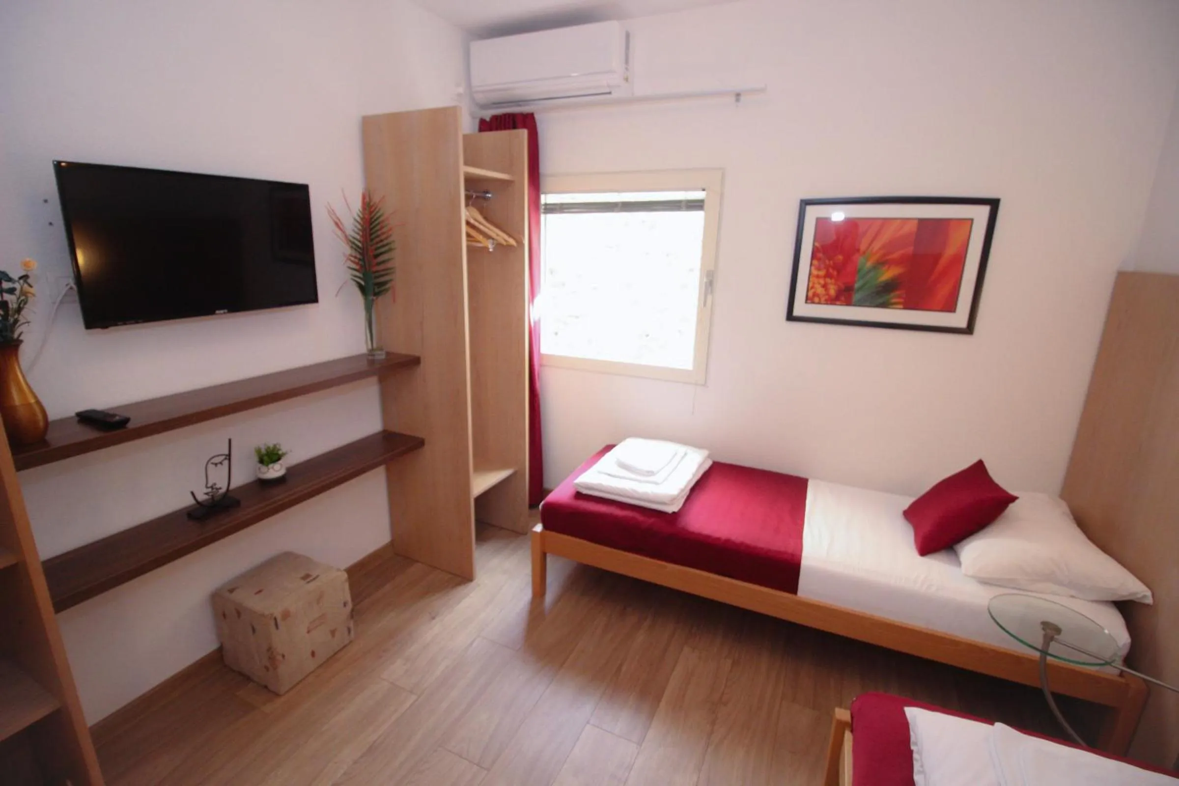 Bed, Seating Area in Motel Deny