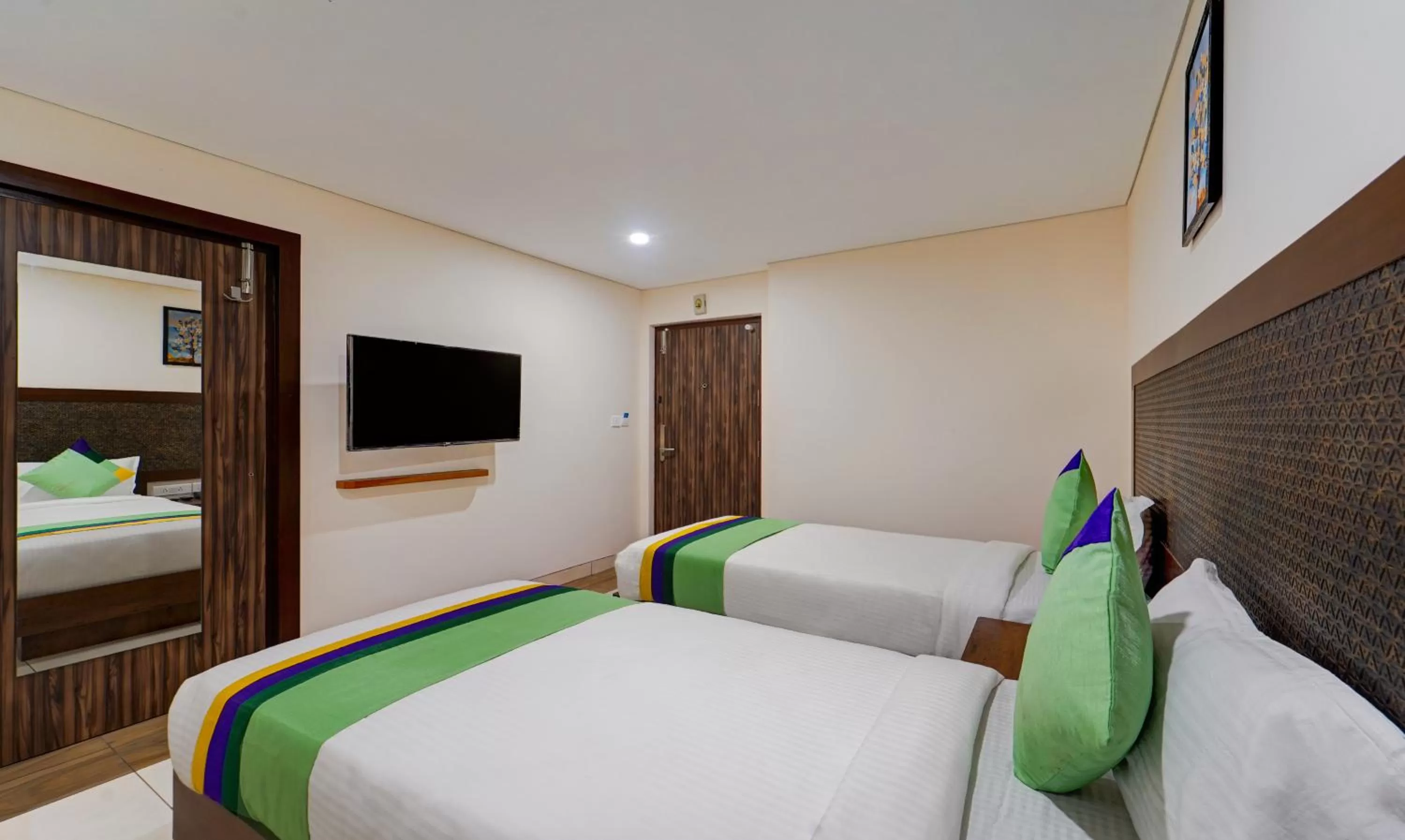 Bed in Treebo Vetri Supreme Residency