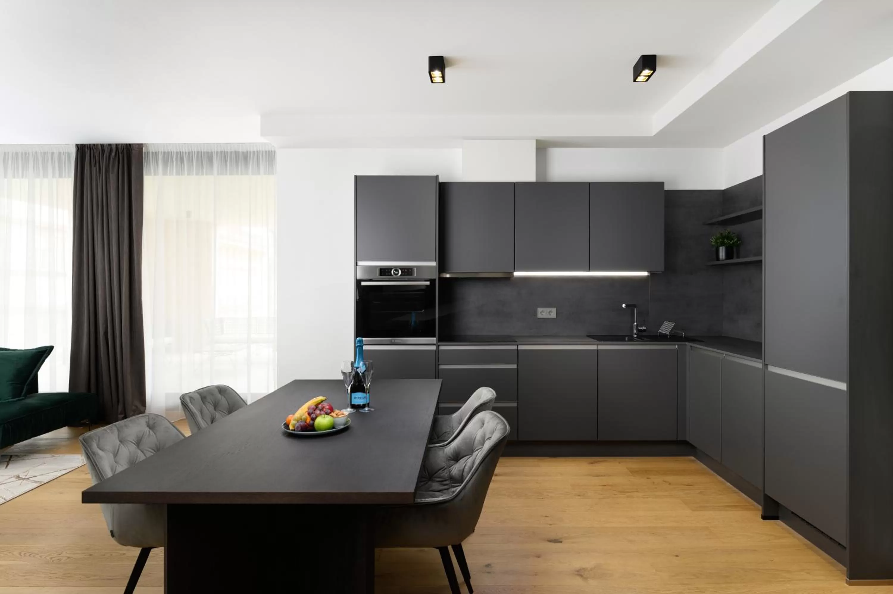 Kitchen or kitchenette in Emerald Downtown Luxury Suites by Continental Group