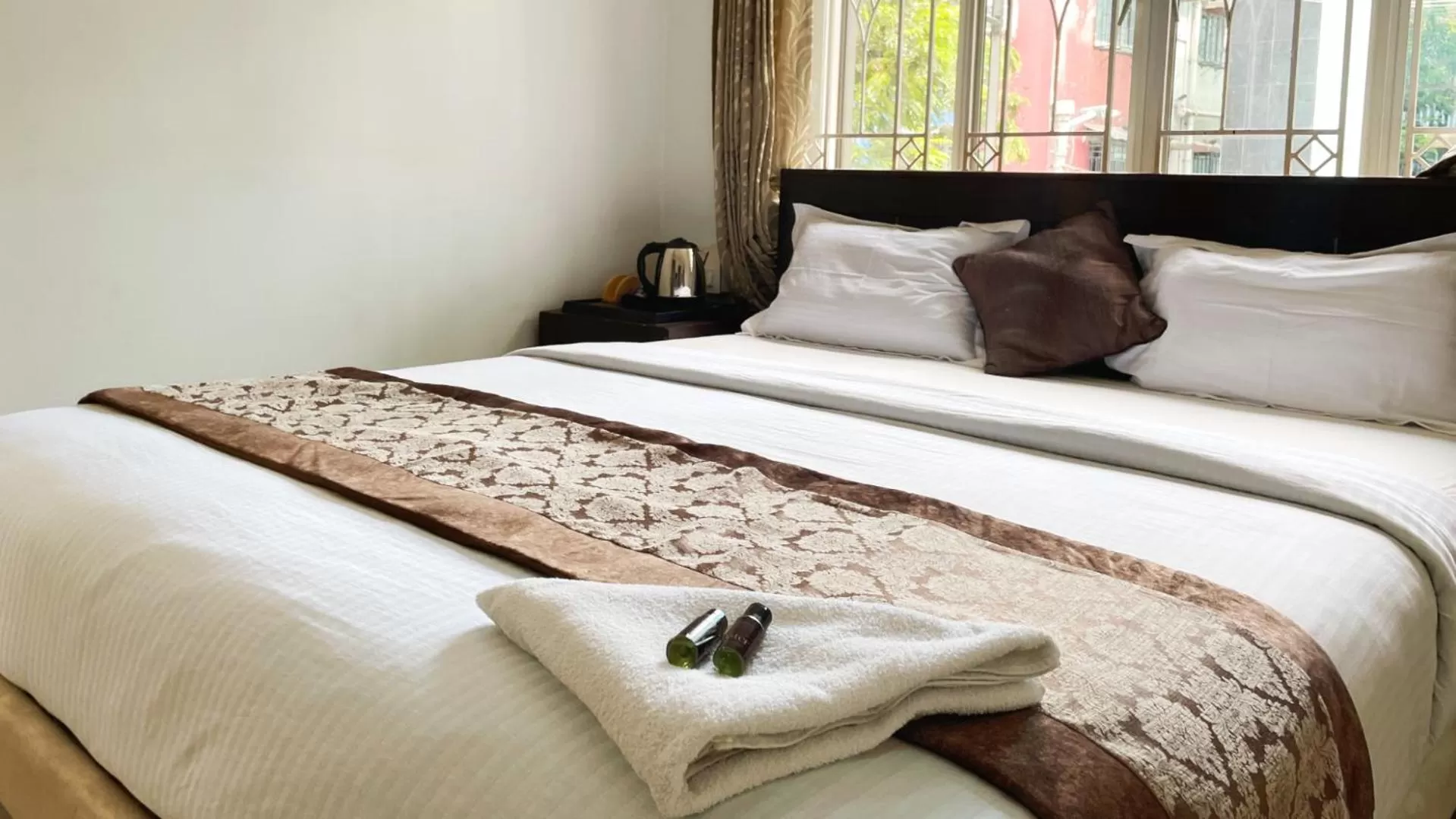 Bed in The Aster Homestay - Bedrooms & Apartments