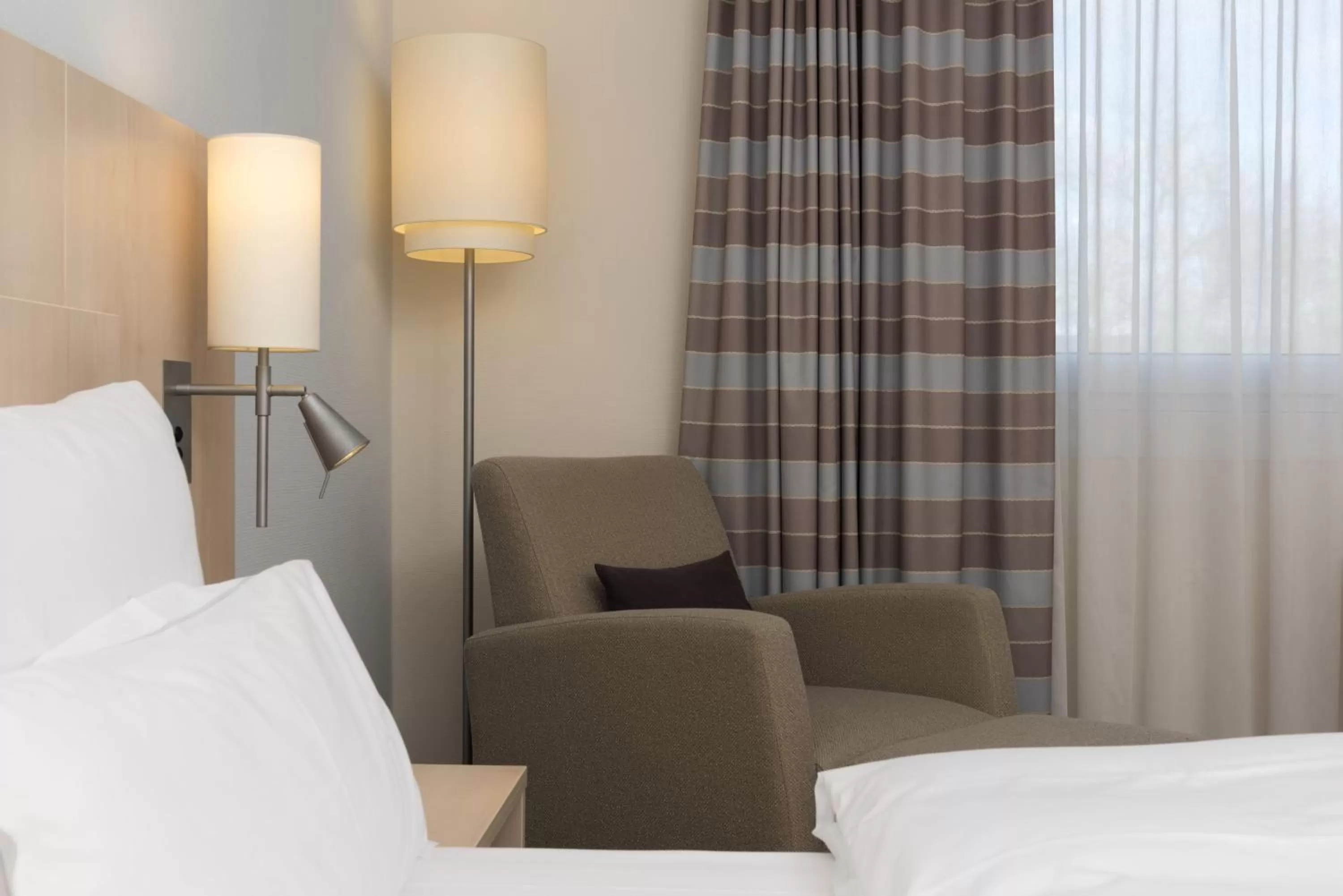 Photo of the whole room, Bed in Mercure Hotel Mannheim am Friedensplatz