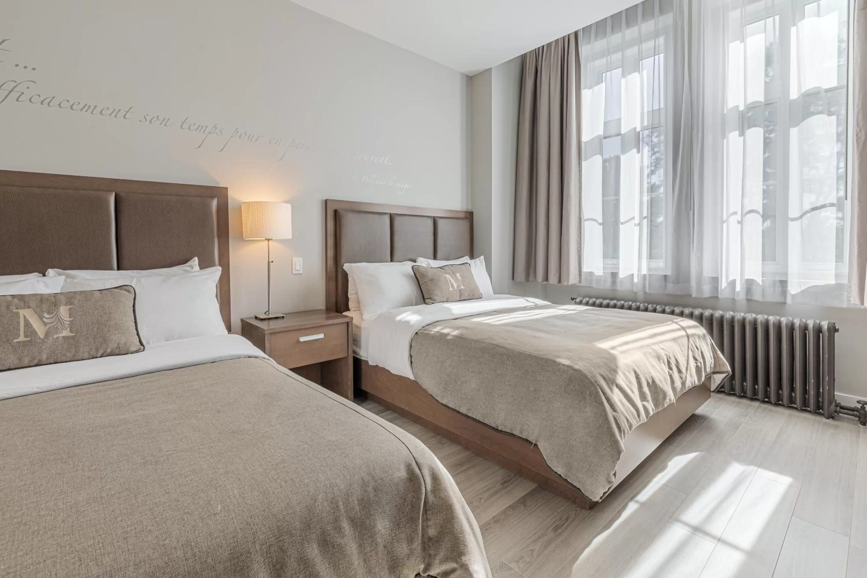 Bed in Hotel Montfort Nicolet