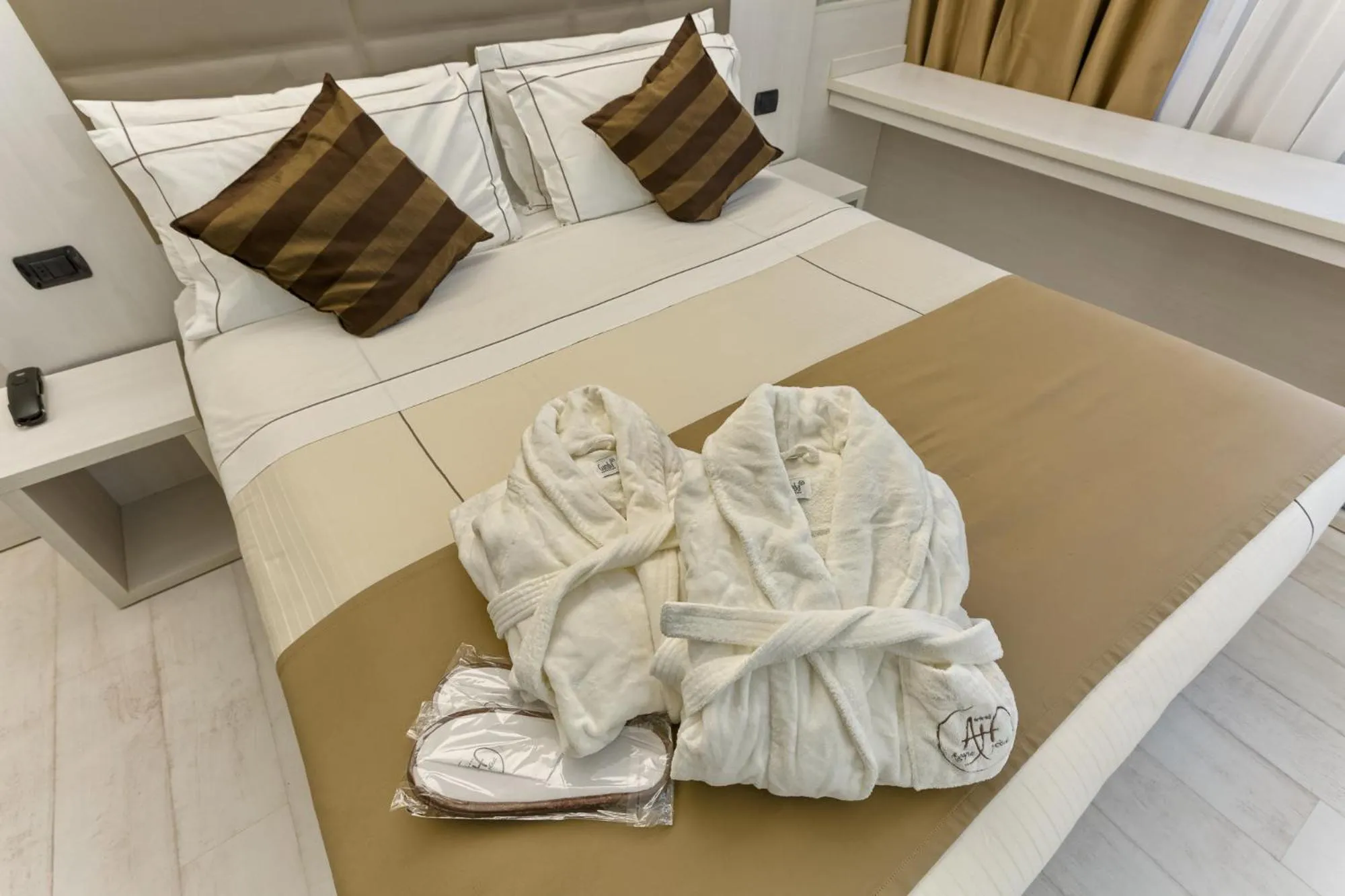 Bed in Agape Hotel AA Hotels