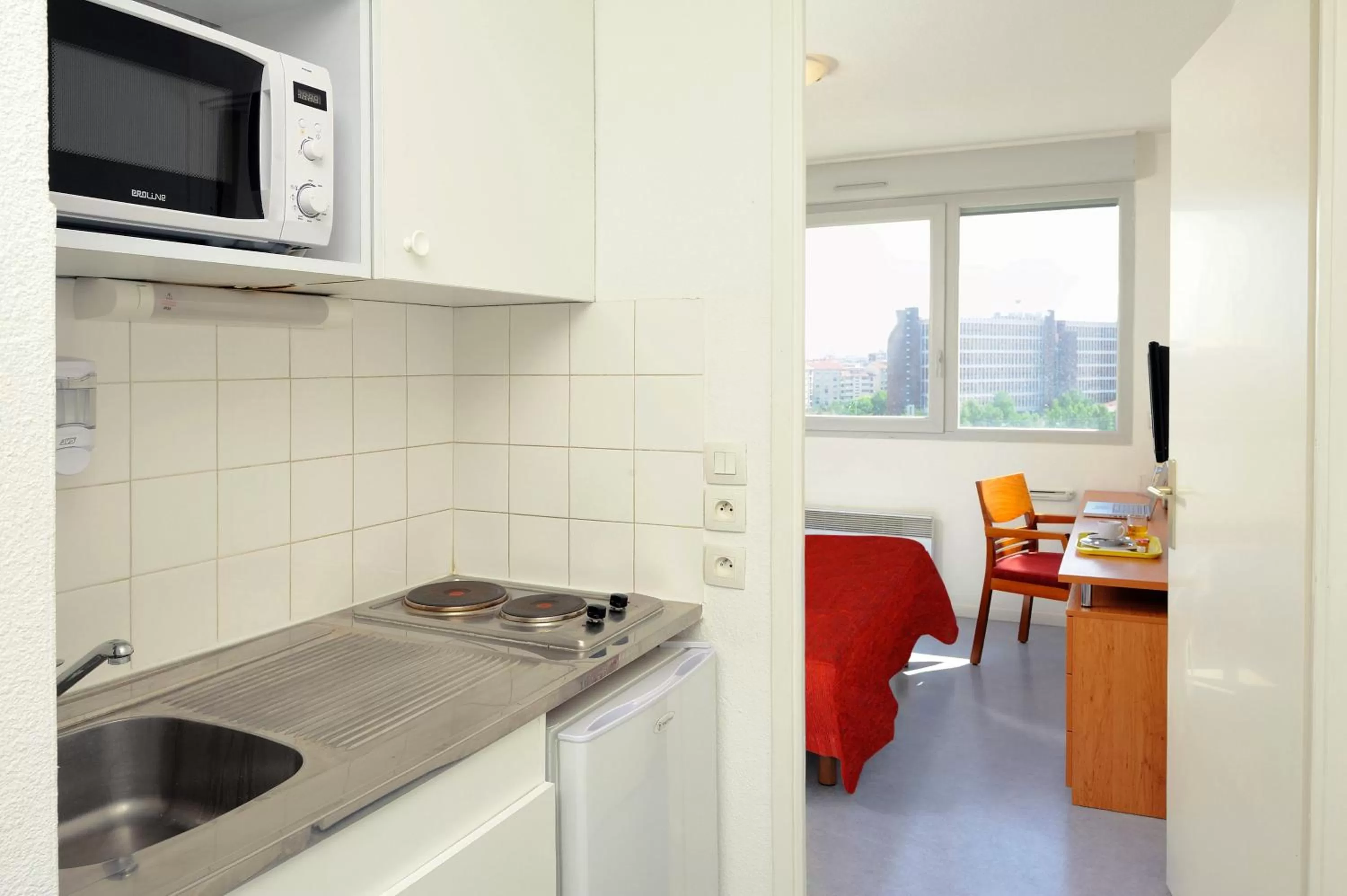 Kitchen or kitchenette in Séjours & Affaires Lyon Saint-Nicolas