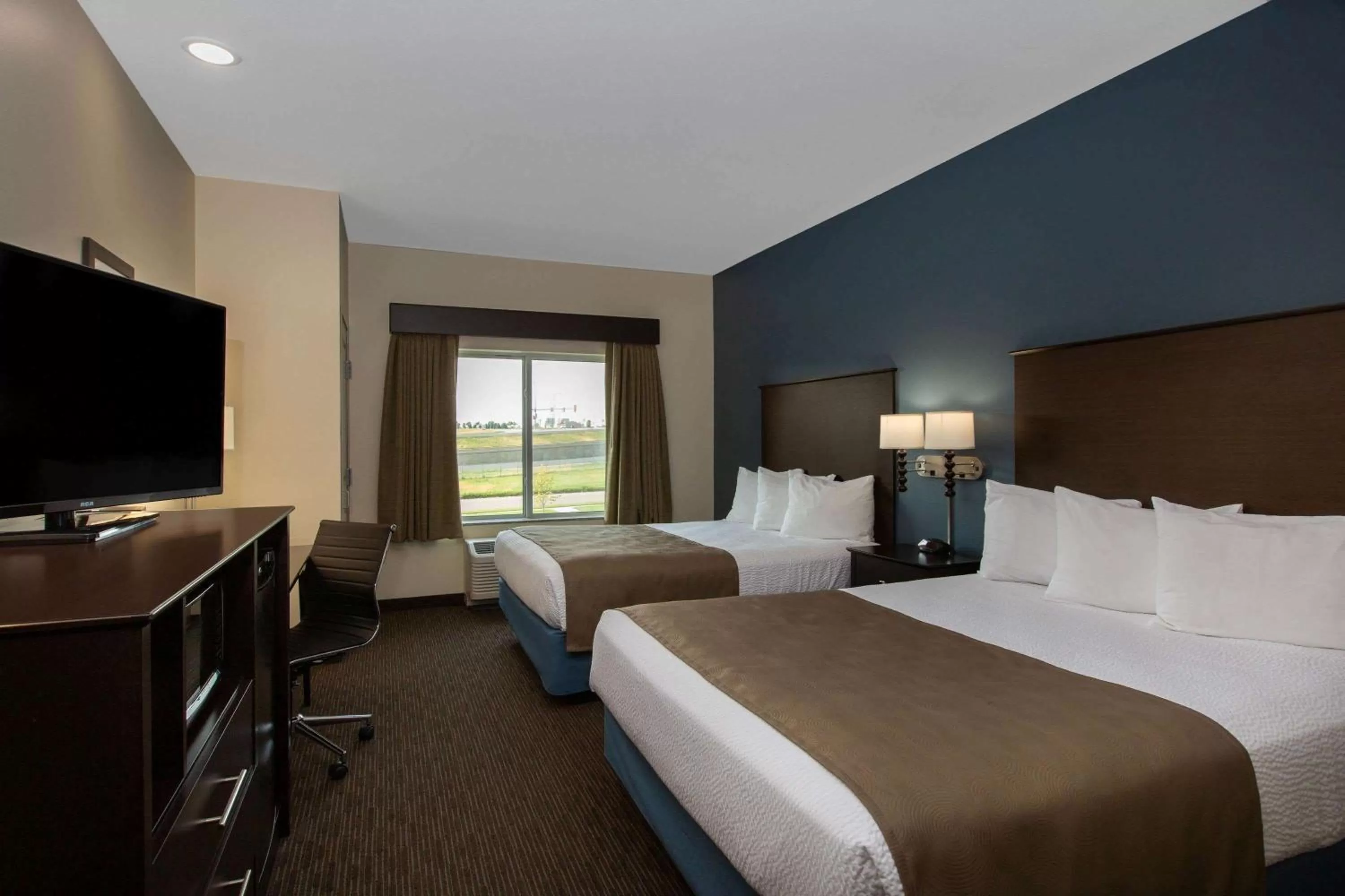 Photo of the whole room, Bed in AmericInn by Wyndham Sioux Falls North