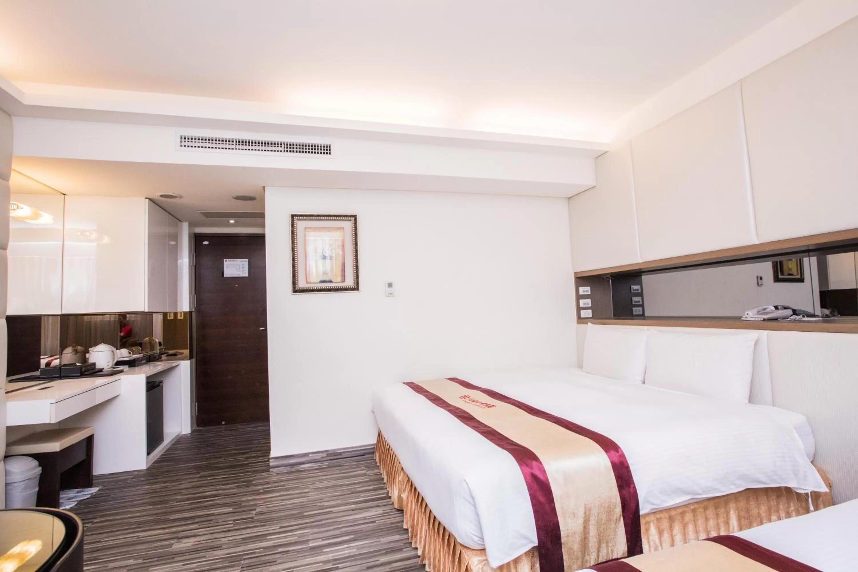 Photo of the whole room in Harmonious Hotel