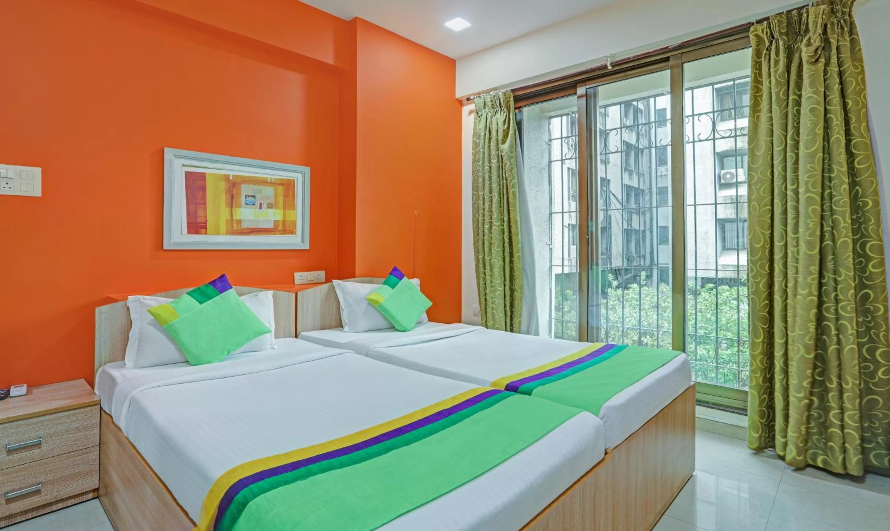 Bed in Treebo Trend Welcome Apartments