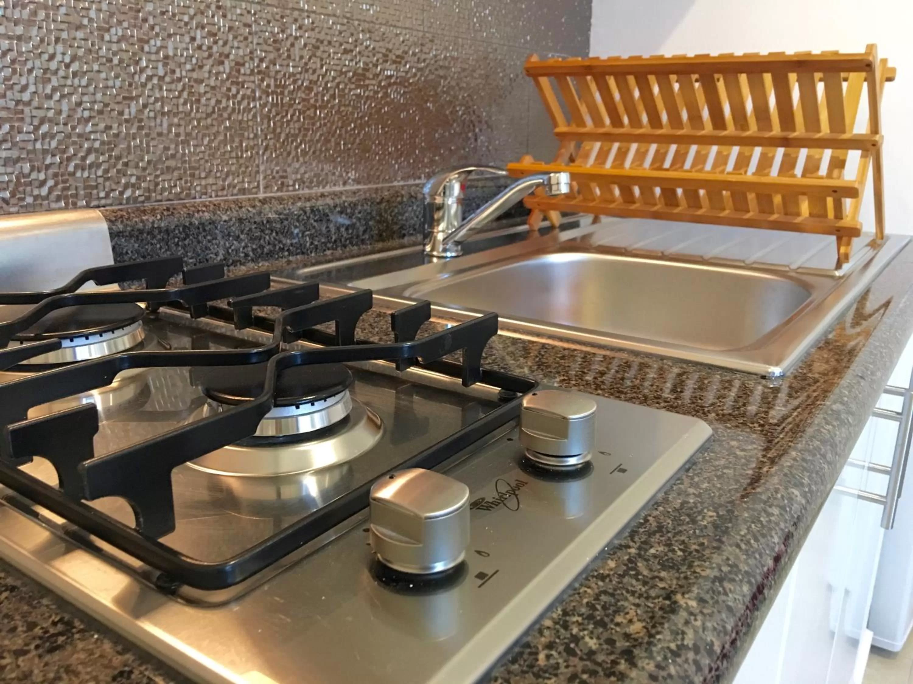 Kitchen or kitchenette in Herbal Inn Suites