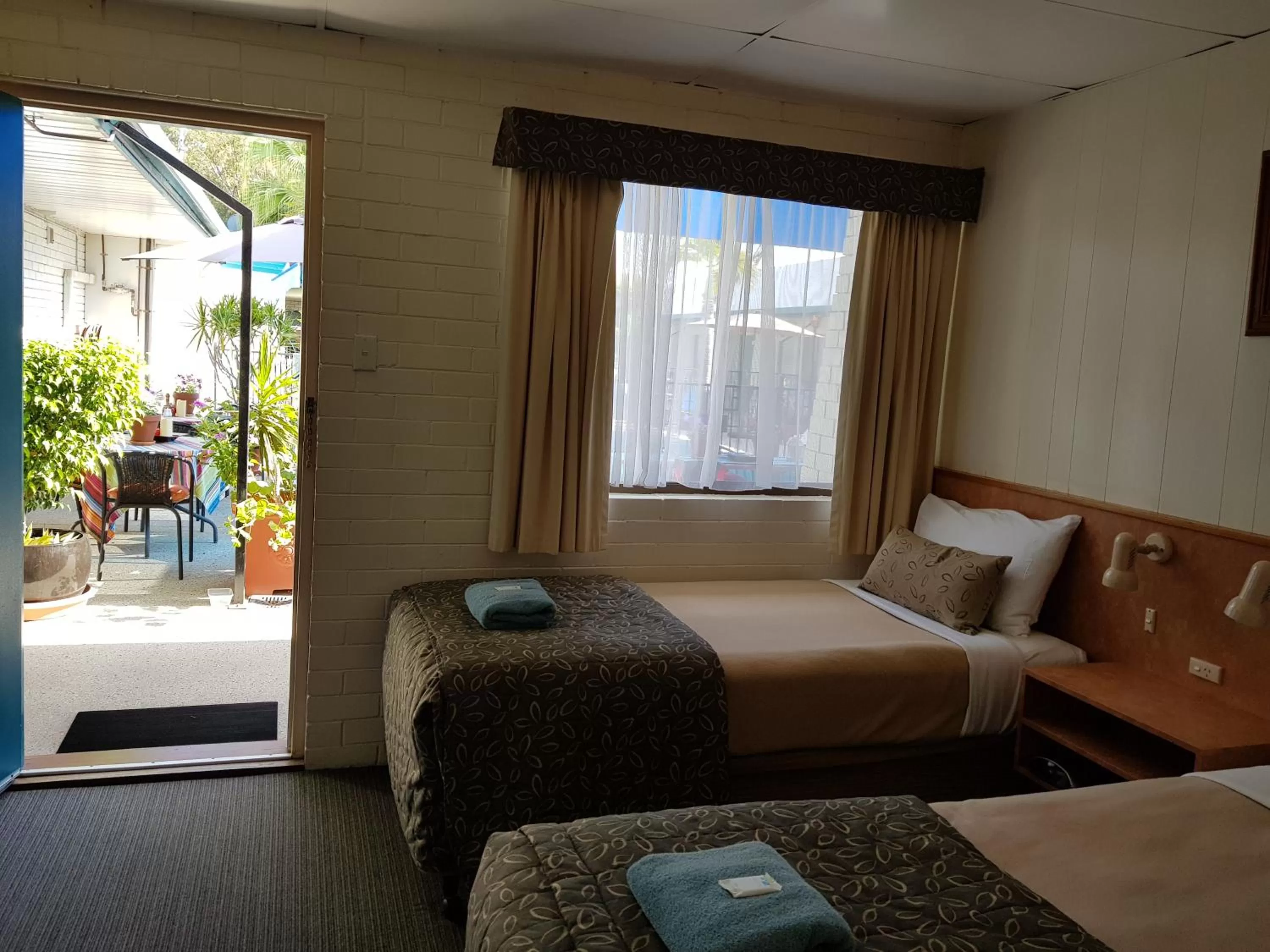 Bed in Peppercorn Motel