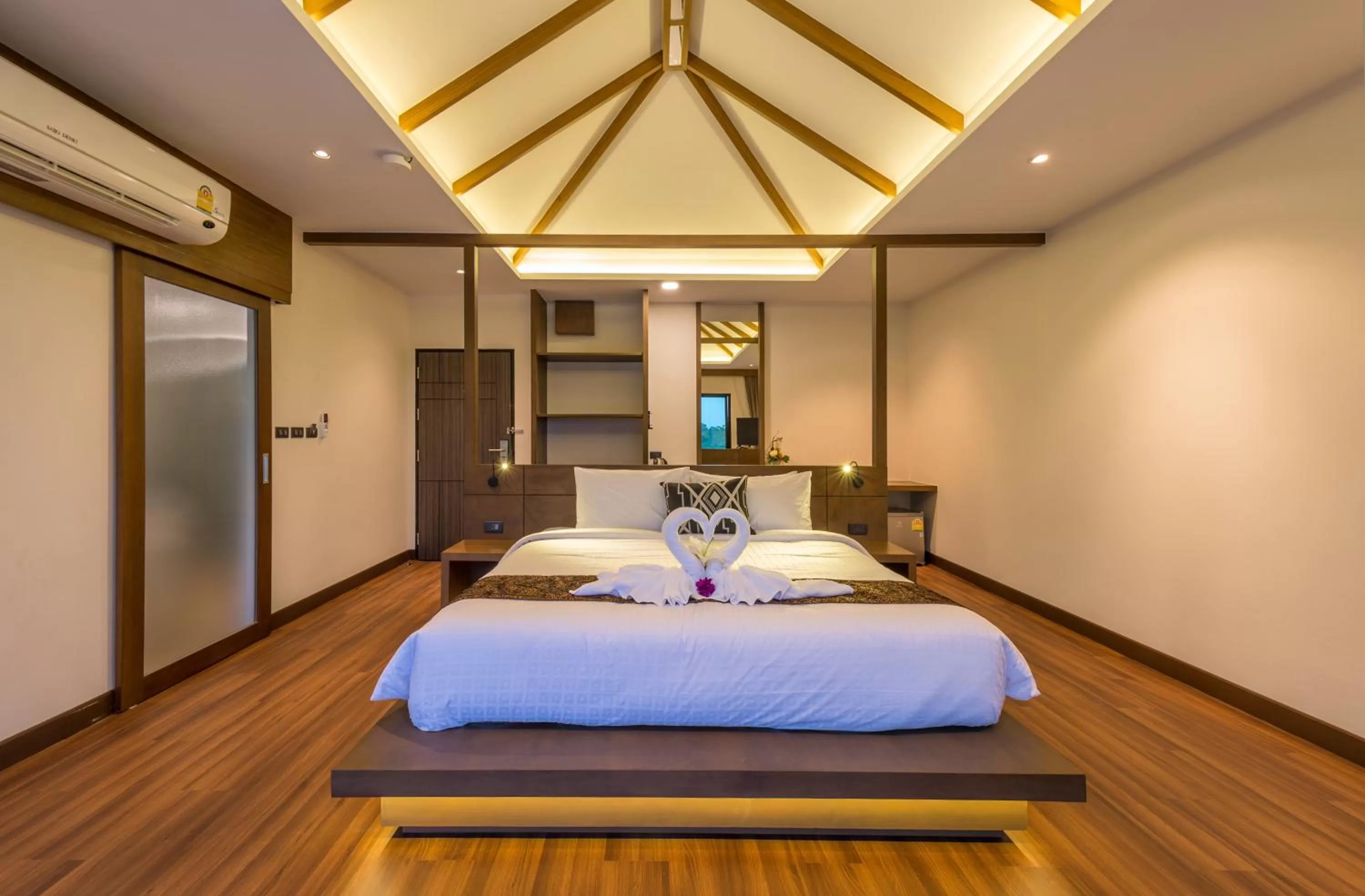 Bed in Cher​mantra​ Aonang​ Resort & Pool​ Suite