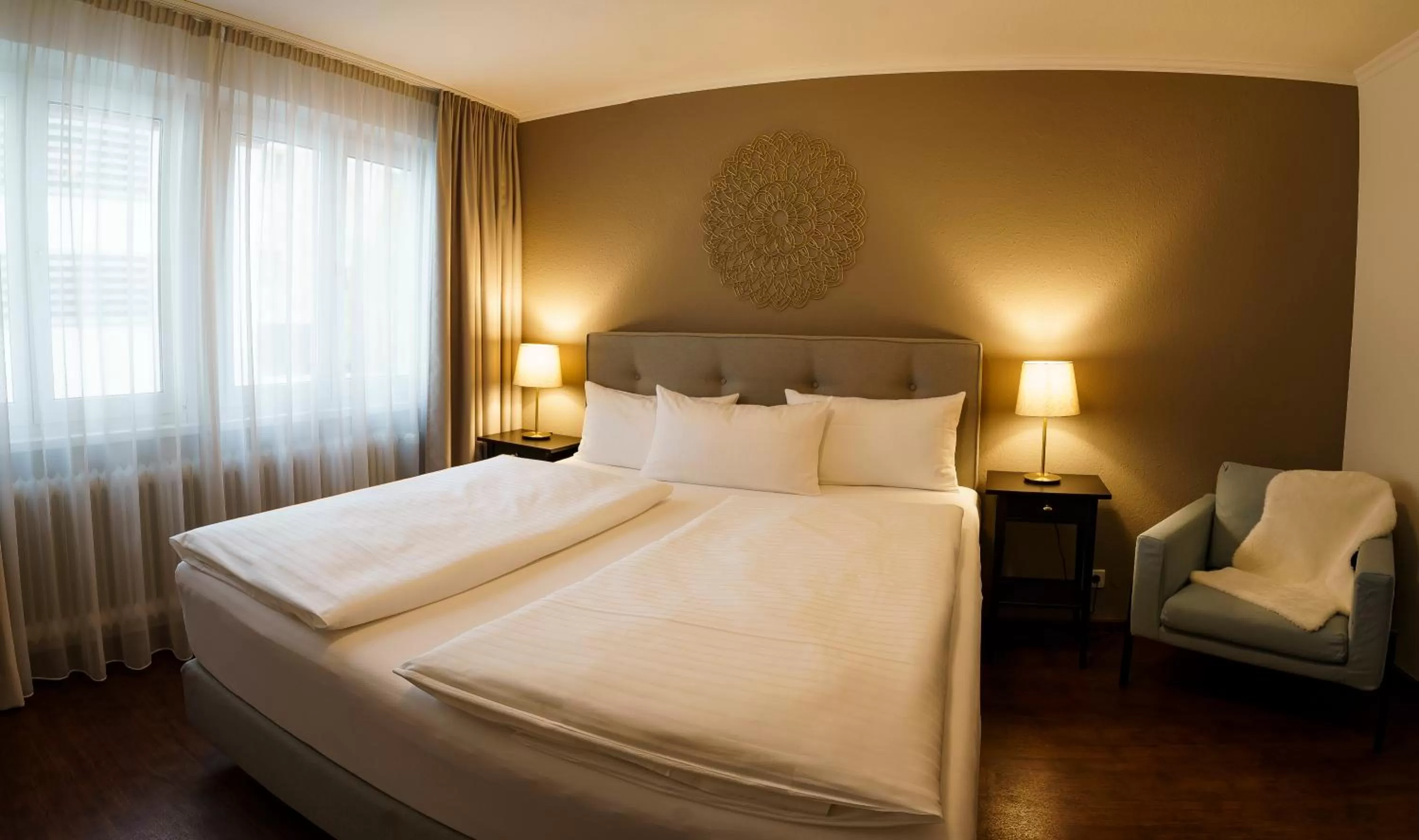 Bed in Hotel Rappen am Münsterplatz