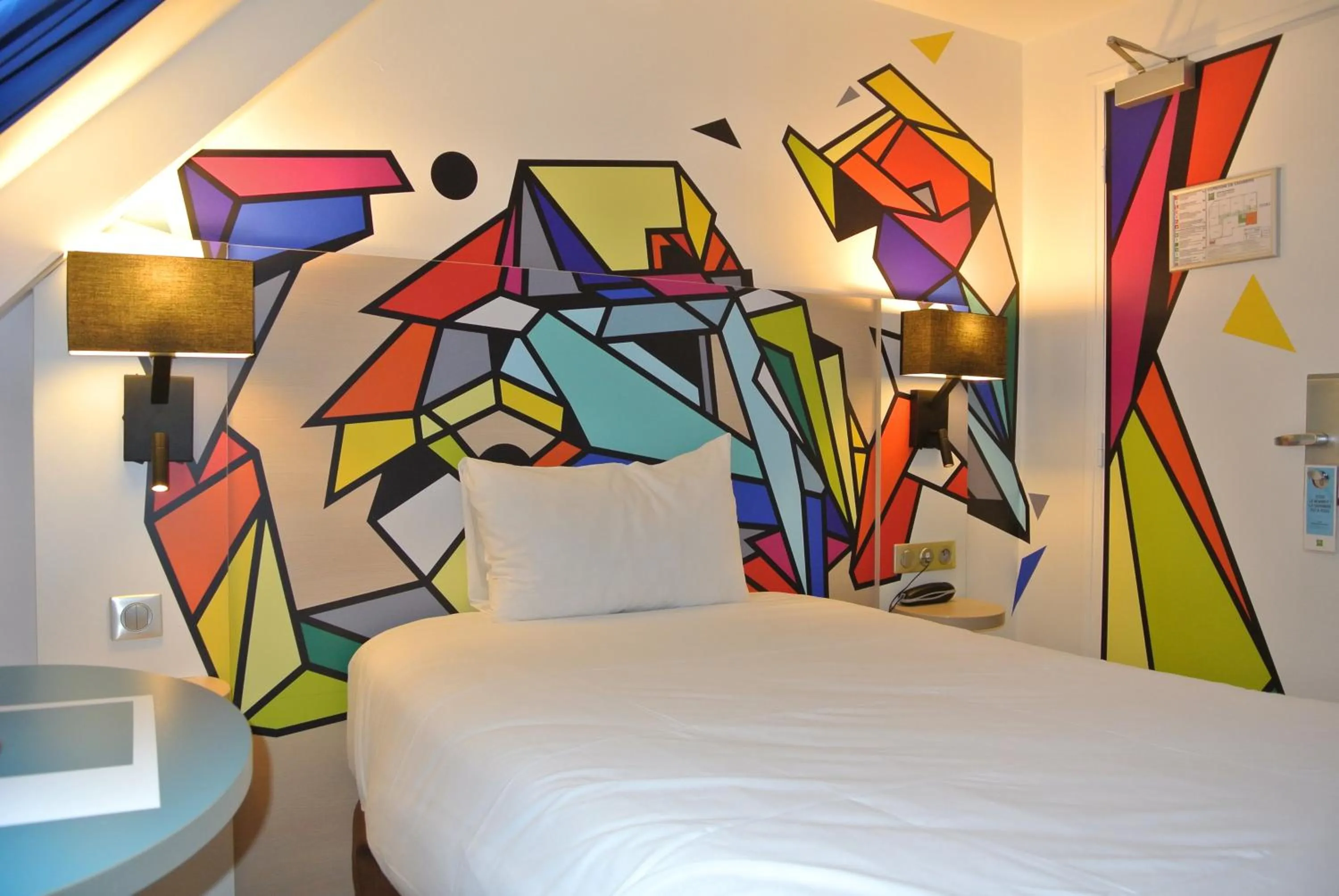 Decorative detail, Bed in ibis Styles Paris Maine Montparnasse