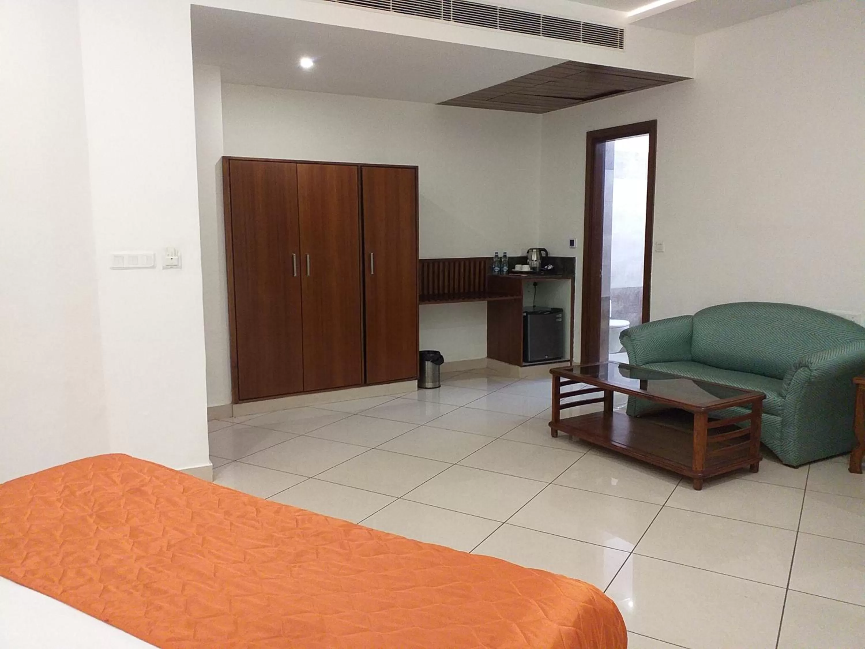 Seating area, Bed in Grand Hotel Nawanshahr