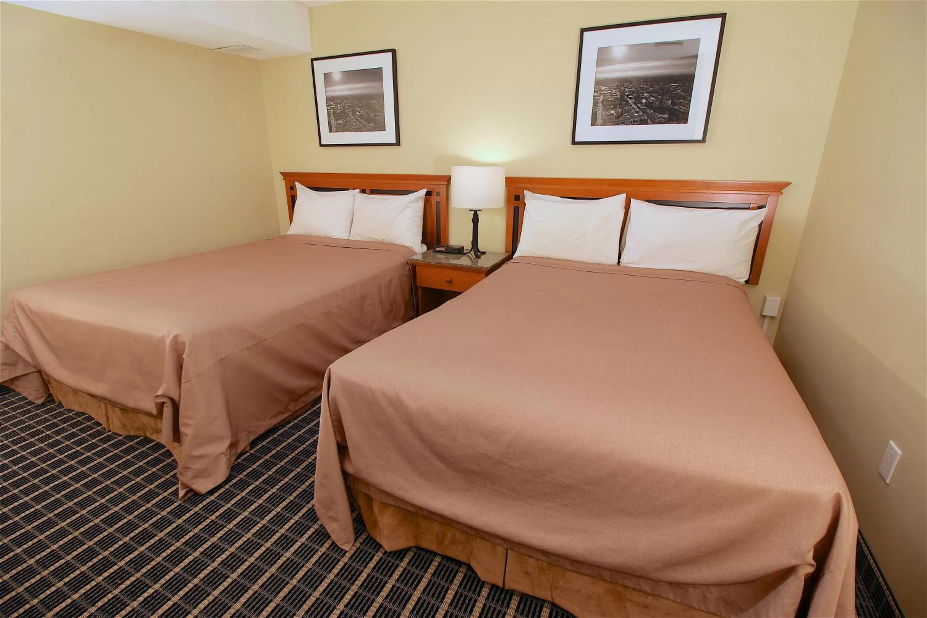 Bed in Medicine Hat Suites