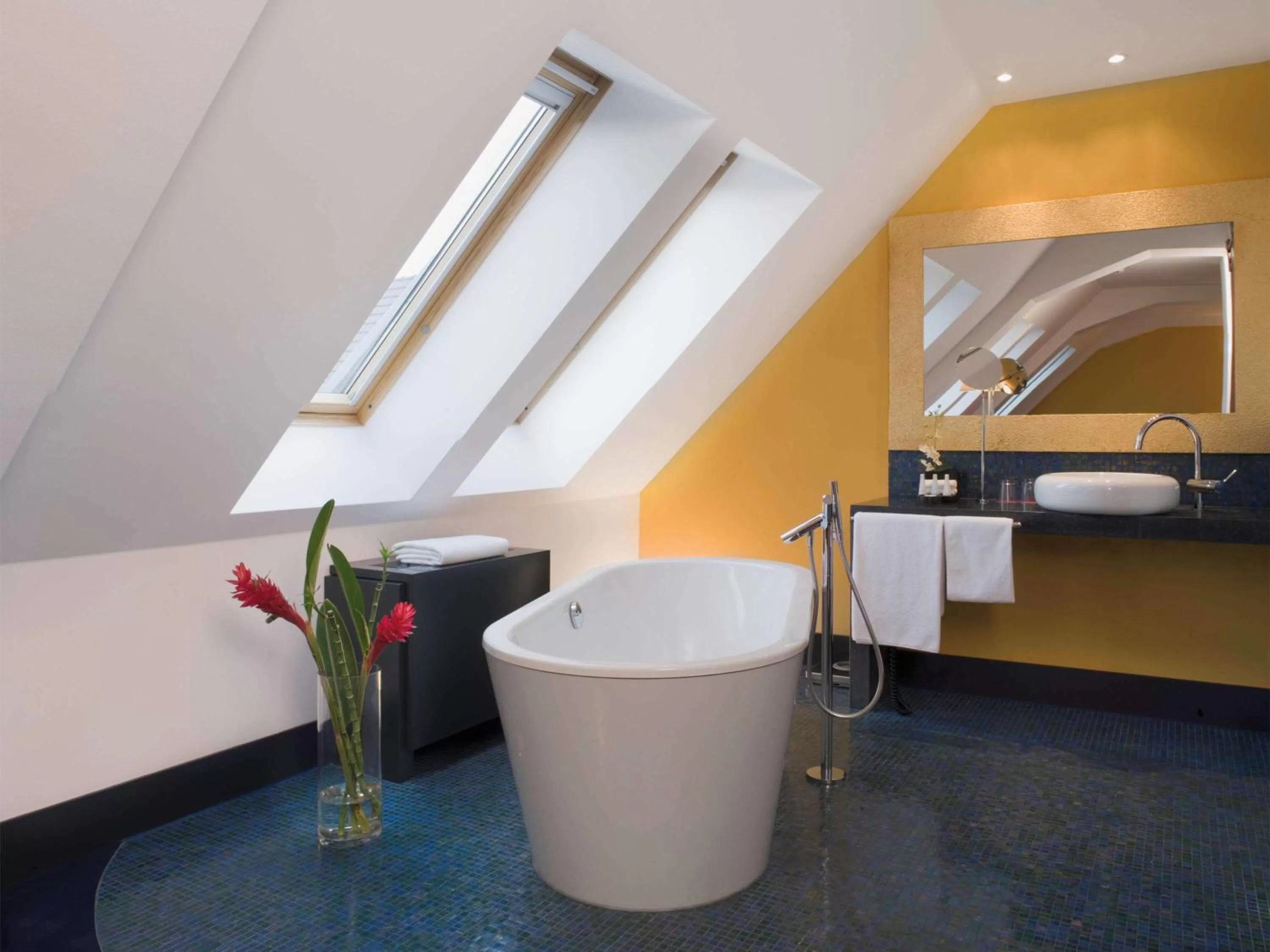 Photo of the whole room, Bathroom in Mövenpick Hotel Berlin Am Potsdamer Platz