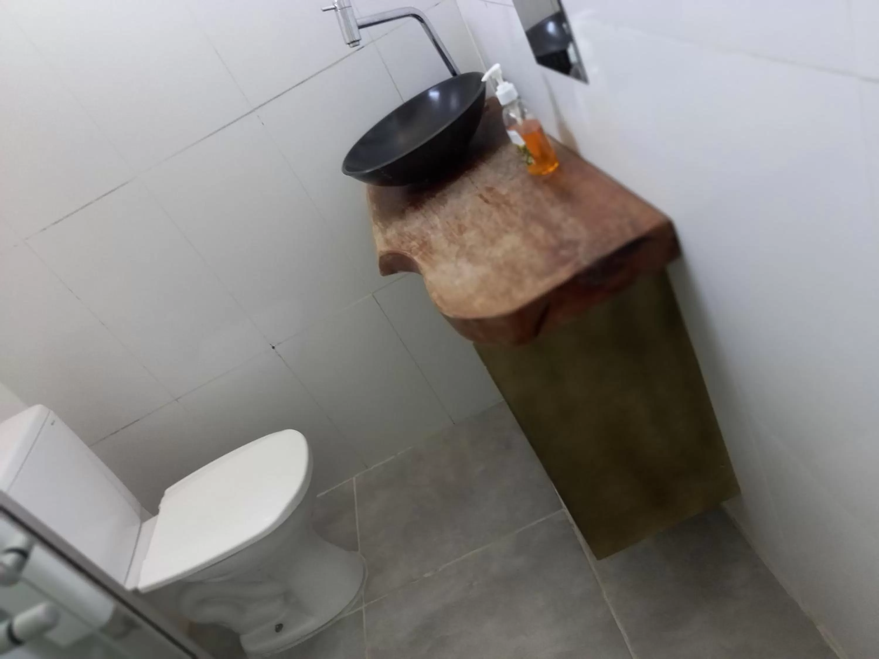 Bathroom in Pousada da Gi Suítes e Turismo