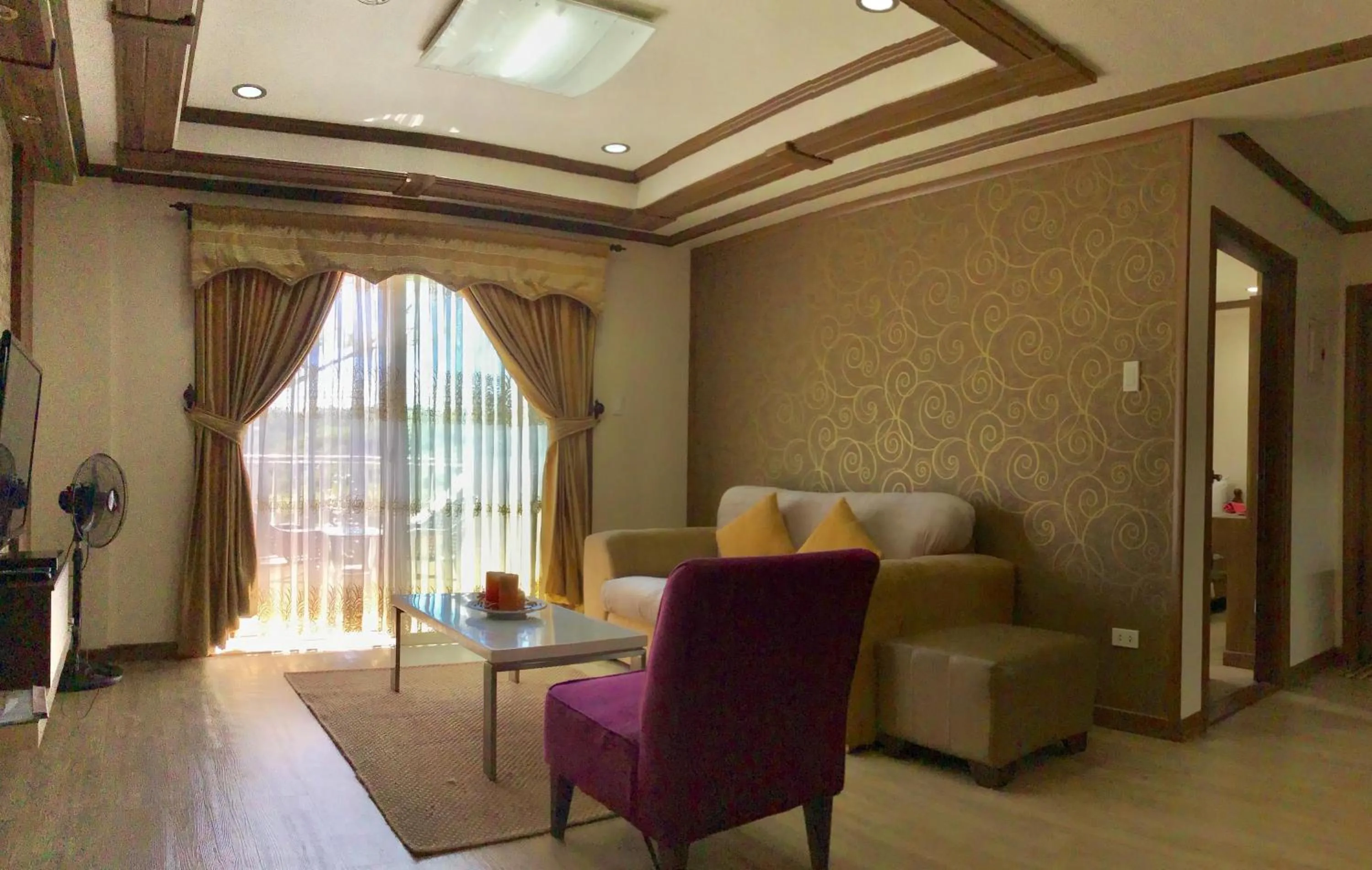 Living room in Prestige Vacation Apartments - Bonbel Condominium