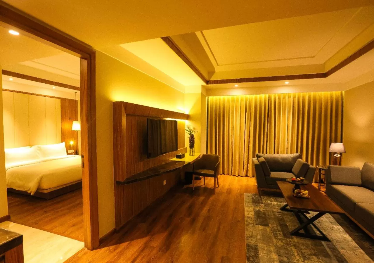 Living room, Bed in Radisson Bhopal