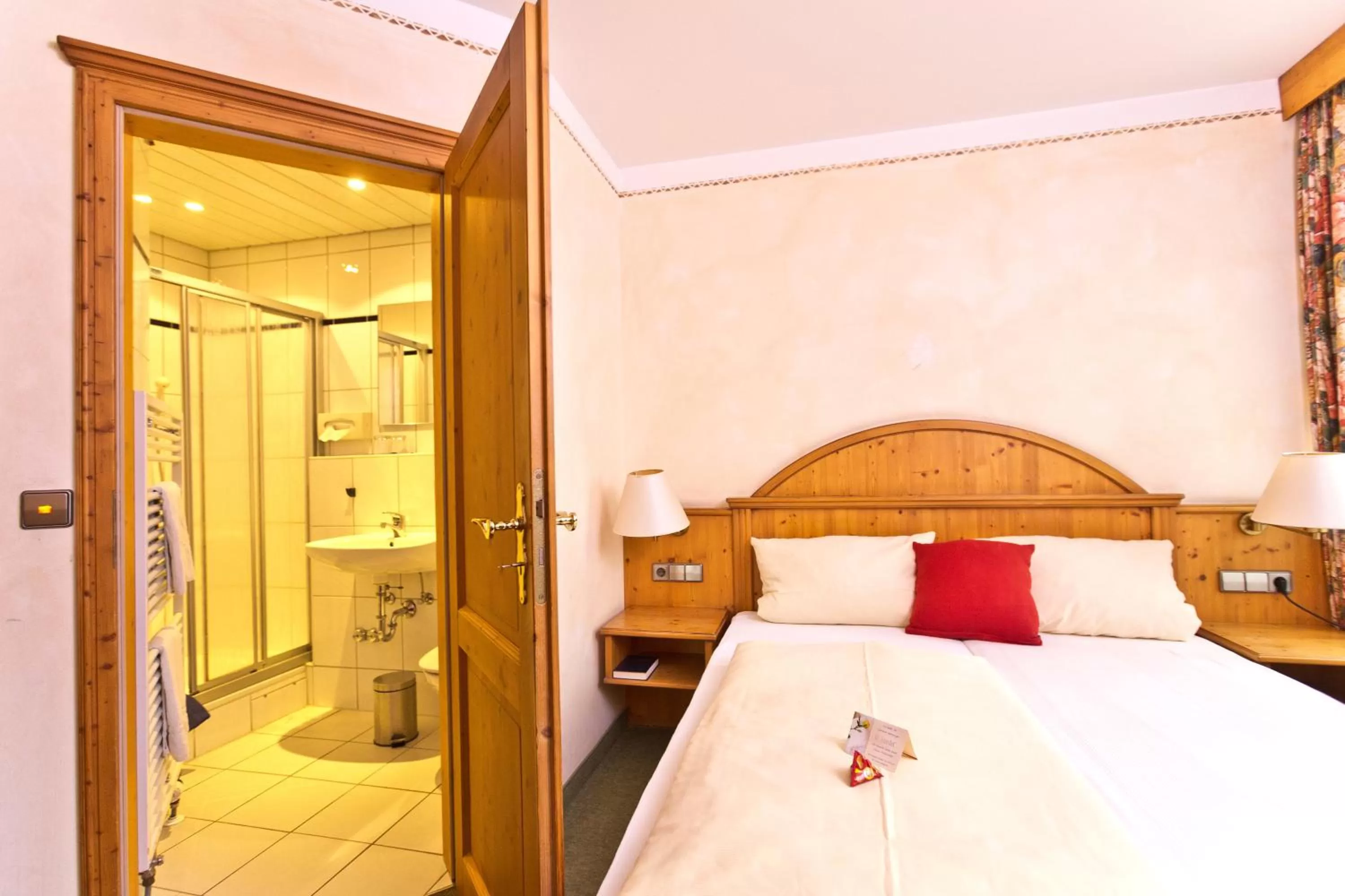 Bed in AKZENT Hotel Krone