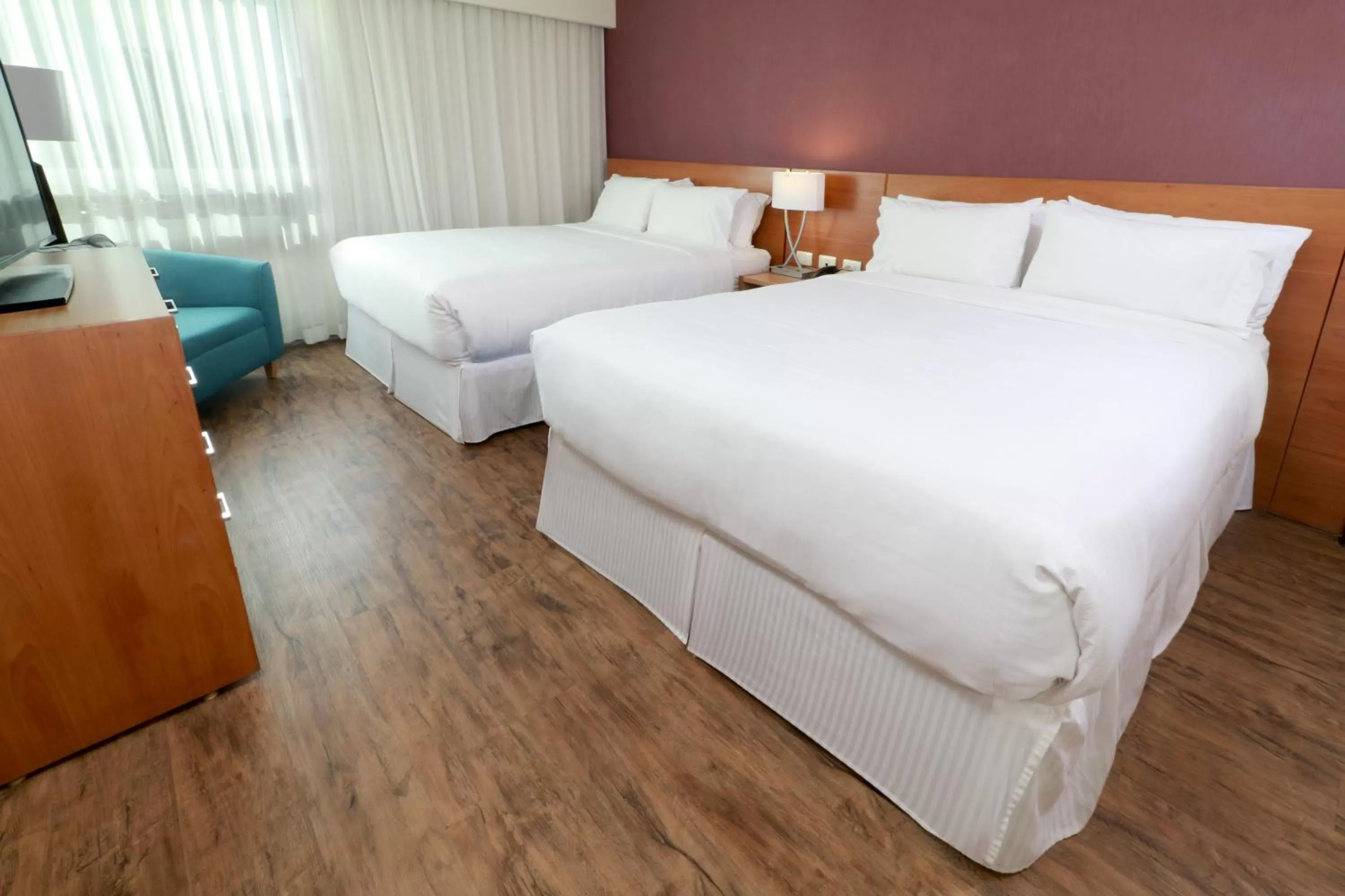 Photo of the whole room, Bed in Staybridge Suites Guadalajara Expo by IHG