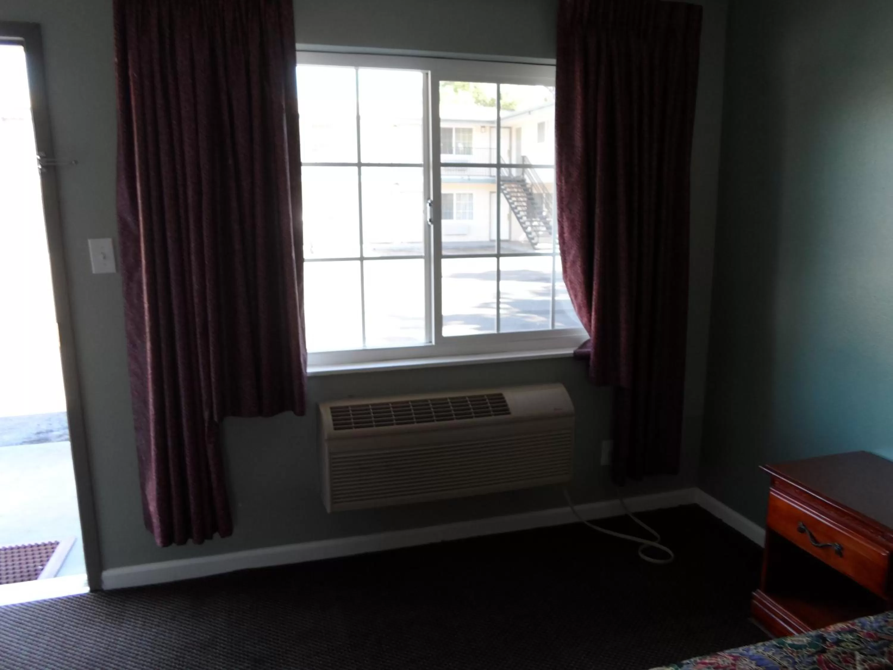 Bedroom in Economy Inn