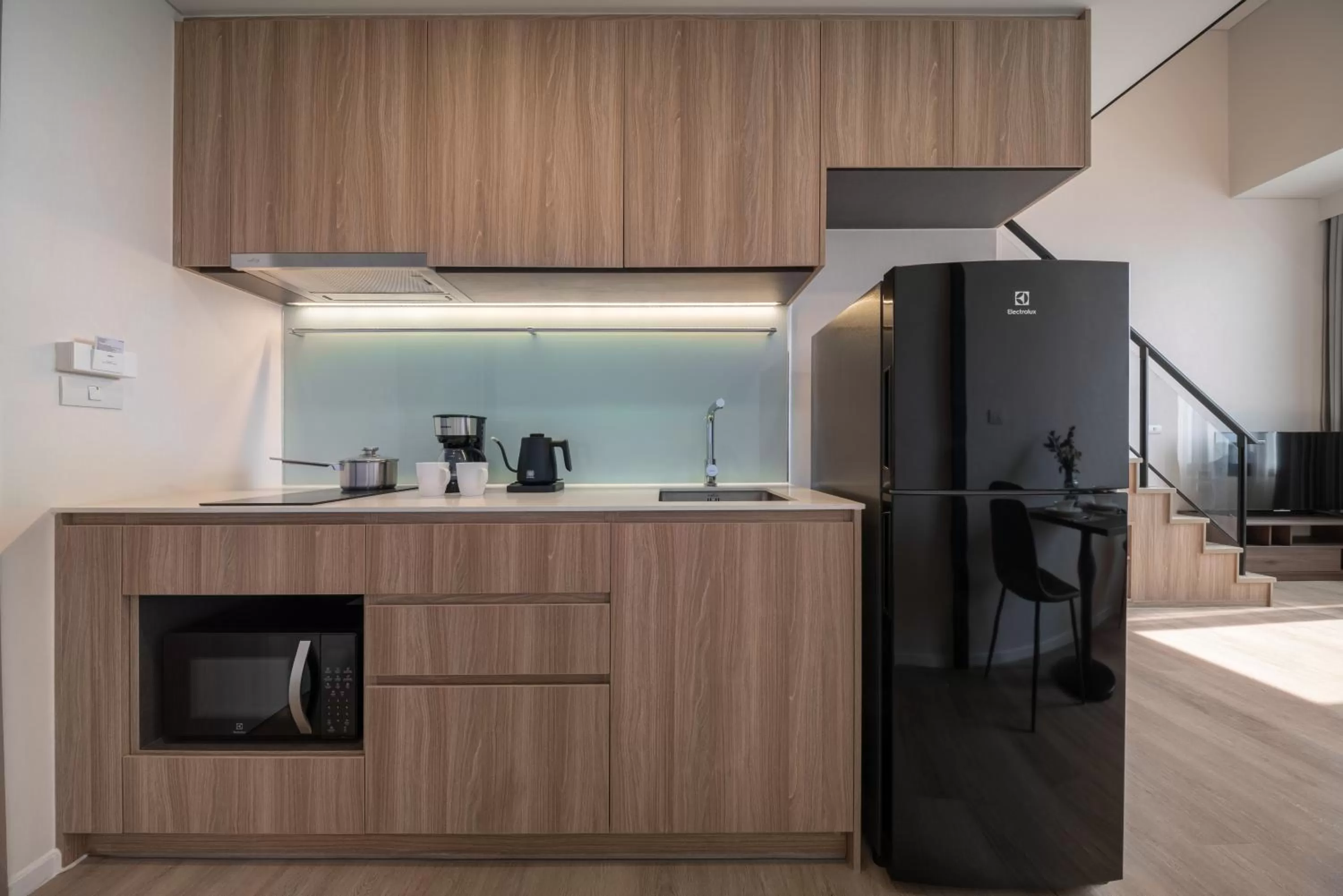 Kitchen or kitchenette in Ramada By Wyndham Bangkok Sukhumvit 87