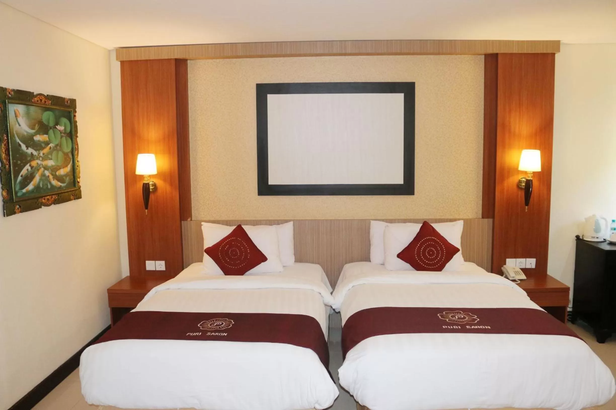 Bed in Puri Saron Hotel Baruna Beach Lovina