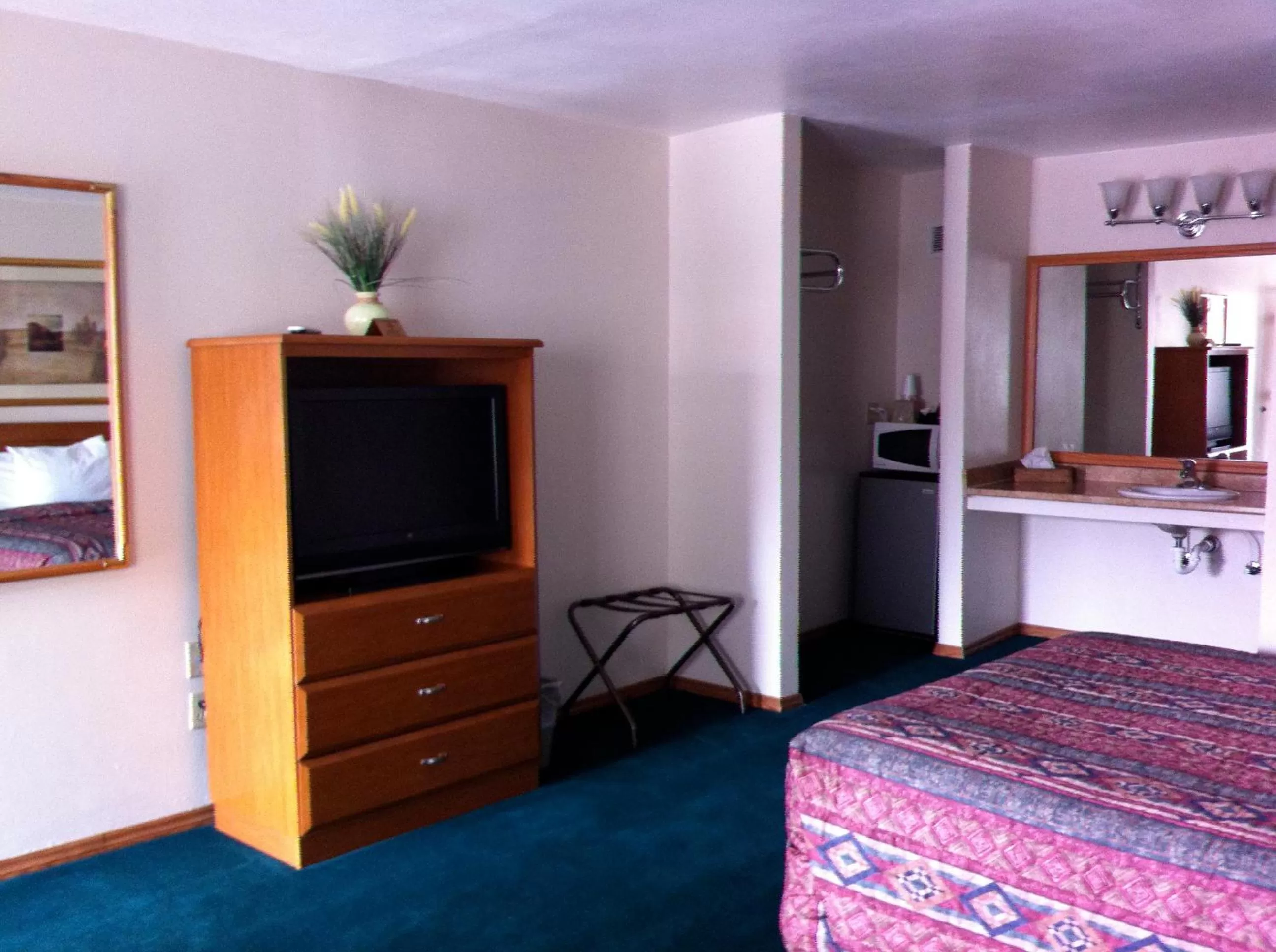 Decorative detail, TV/Entertainment Center in Legacy Inn