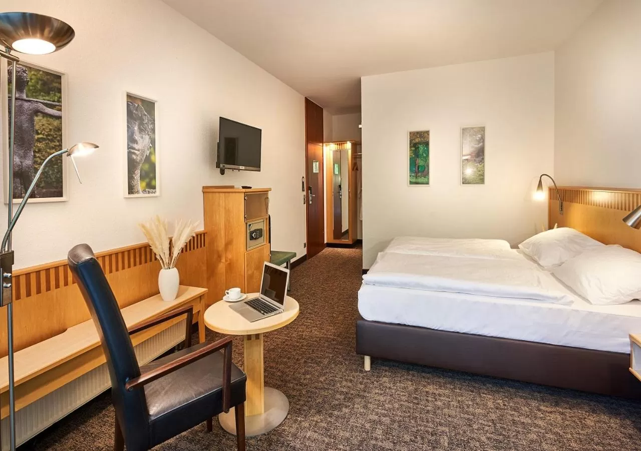 Photo of the whole room, Bed in Parkhotel Nümbrecht