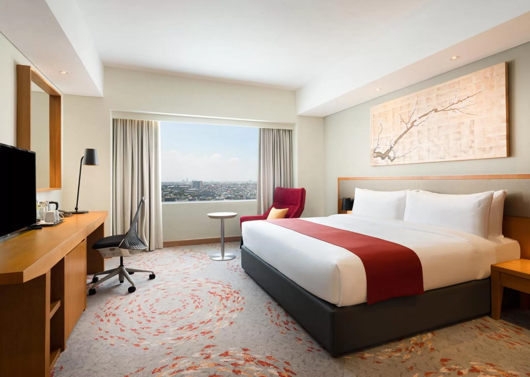 Photo of the whole room, Bed in Holiday Inn & Suites Jakarta Gajah Mada by IHG