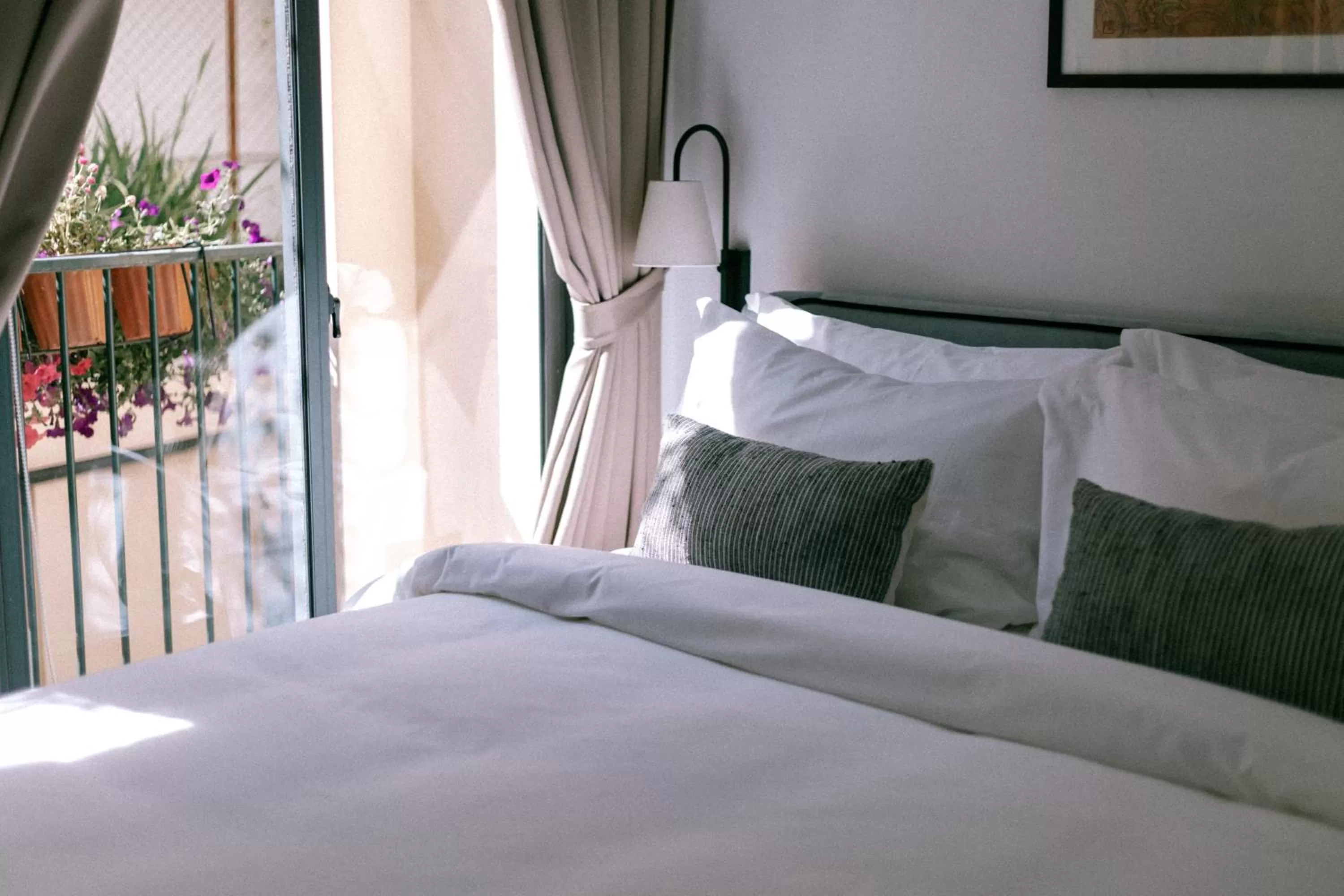 Bed in La Chronique Hotel